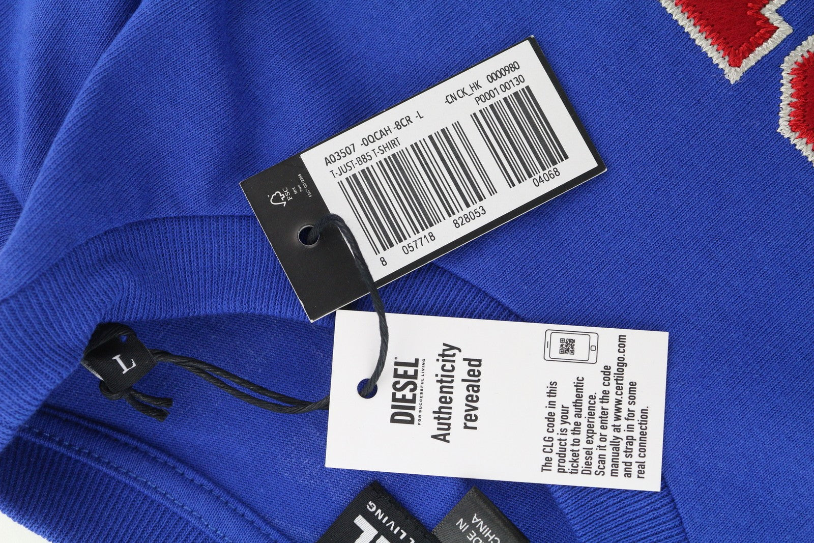 DIESEL T-Just-B85 vyriški marškinėliai L dydžio, mėlyni, trumpomis rankovėmis, apvalia apykakle, trikotažo raštu.