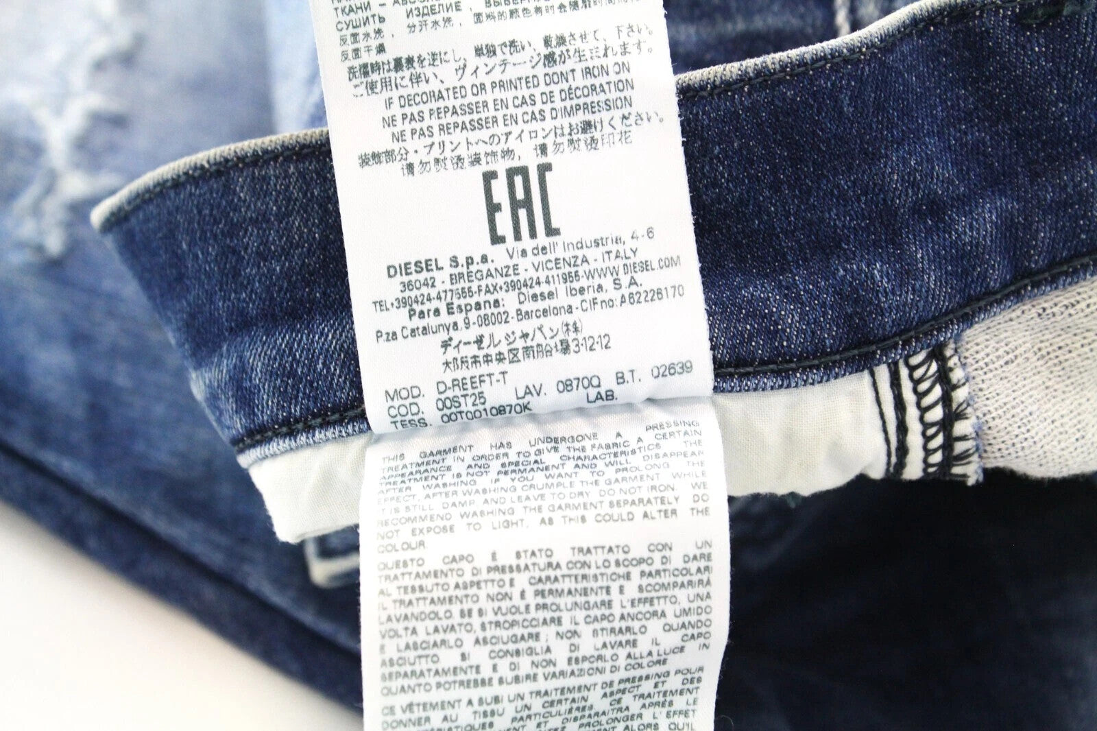 DIESEL D-Reeft-T 0870O vyriški W26 sportiniai jogg aptempti džinsai su sendintų dėmių efektu 