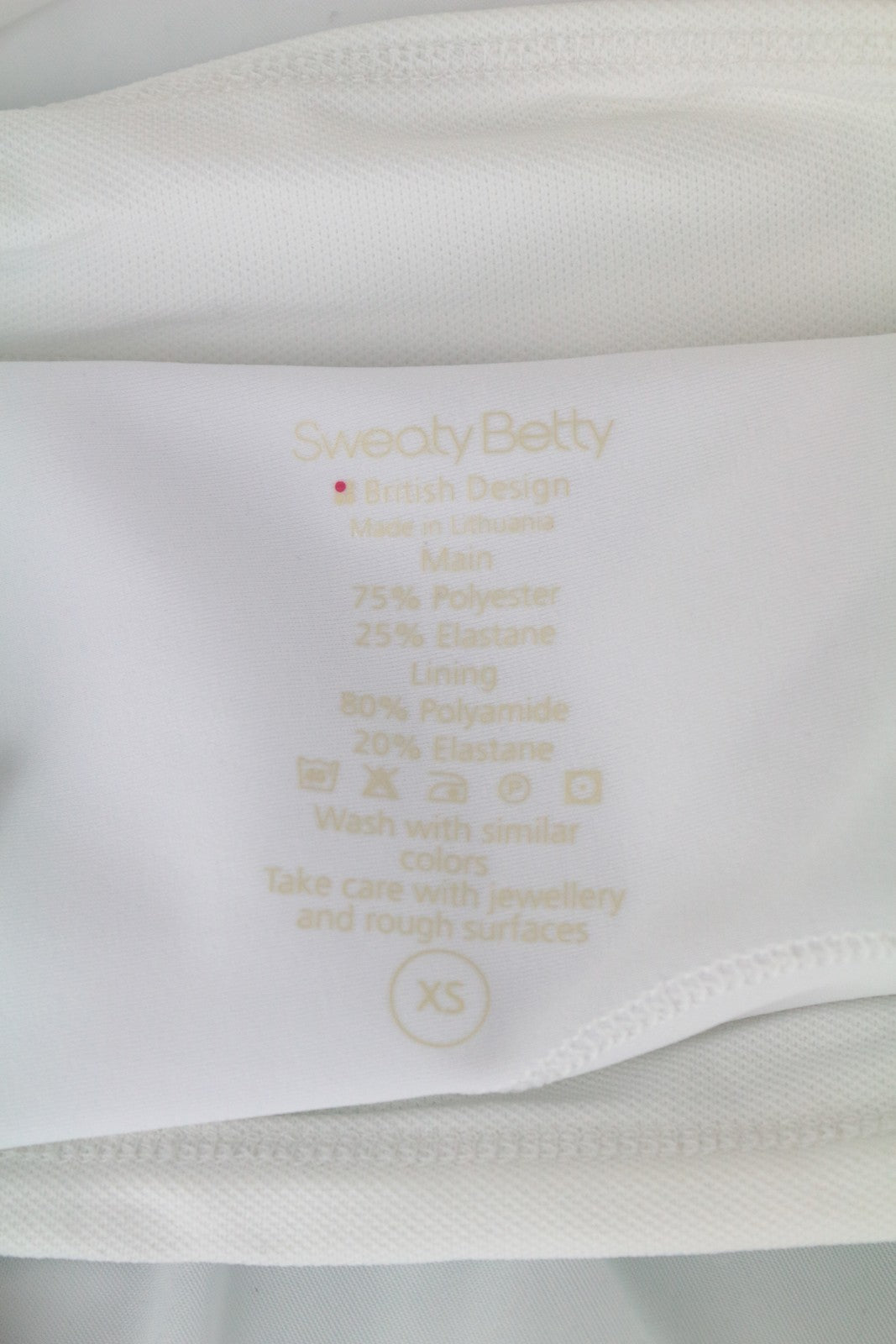 SWEATY BETTY moteriškas „Match Play“ sijonas XS, baltas, burbulinis, tamprus teniso sijonas 