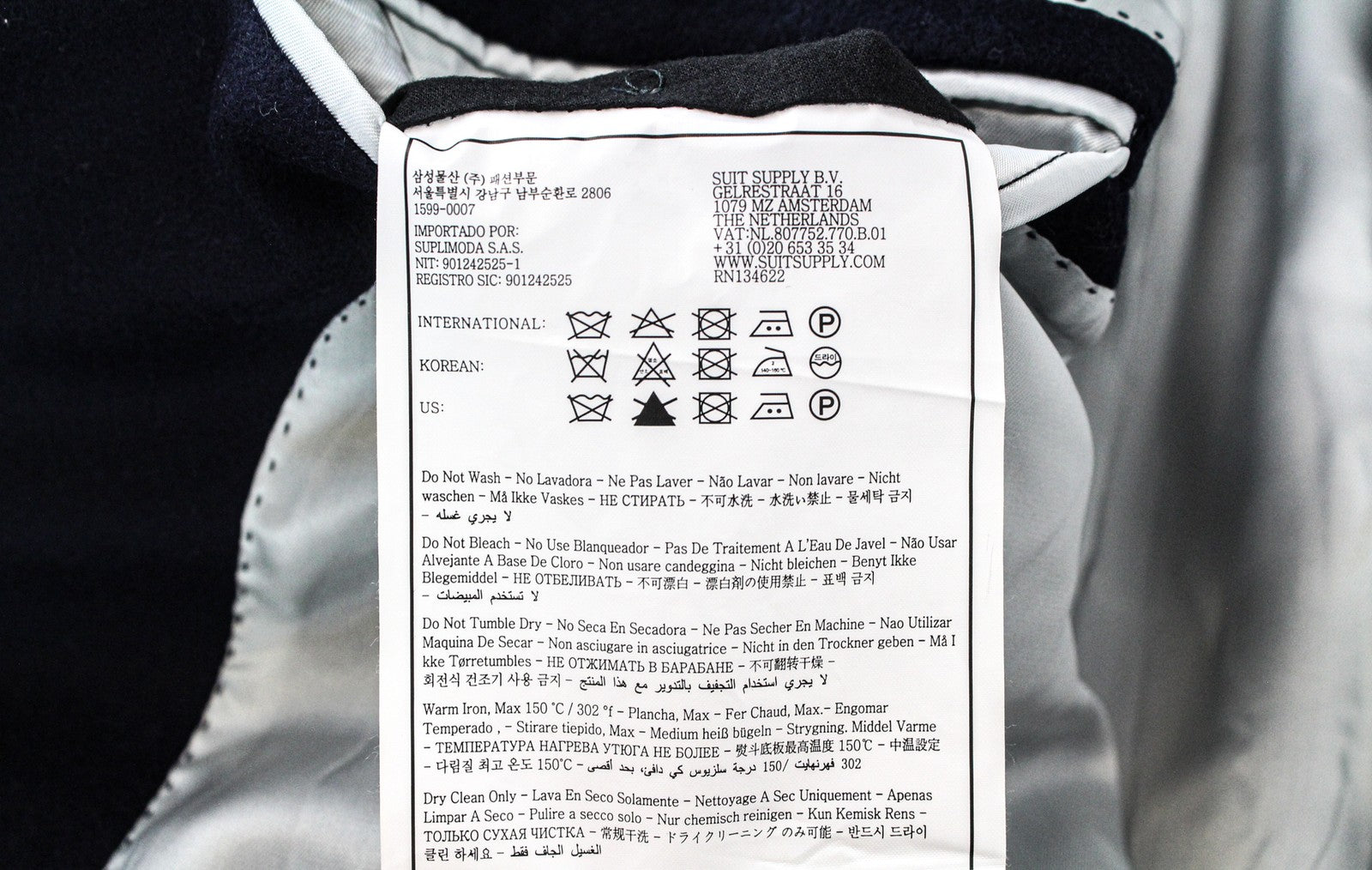 „SUITSUPPLY Vicenza“ vyriškas paltas, UK48R, mėlynas, vilnonis, su pamušalu, vidutinio ilgio, vienaeilis. 