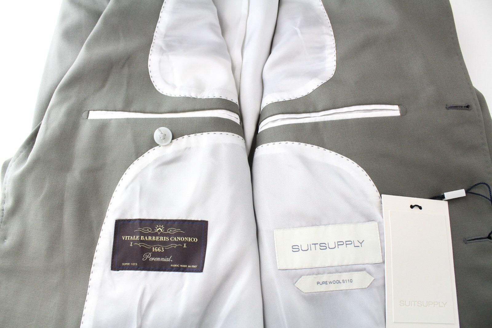 „SUITSUPPLY Havana Tulip“ vyriškas kostiumas, žalias, su grynos vilnos pamušalu, dviejų dalių. 