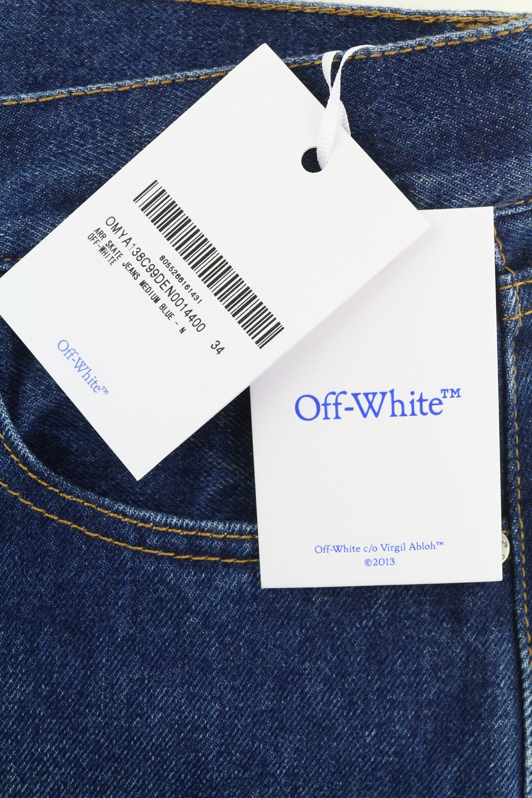 OFF-WHITE „Arr Skate“ vyriški džinsai W34 su mėlyna spalva, įprasto kirpimo, su sagomis, rekomenduojama kaina – 645 € 