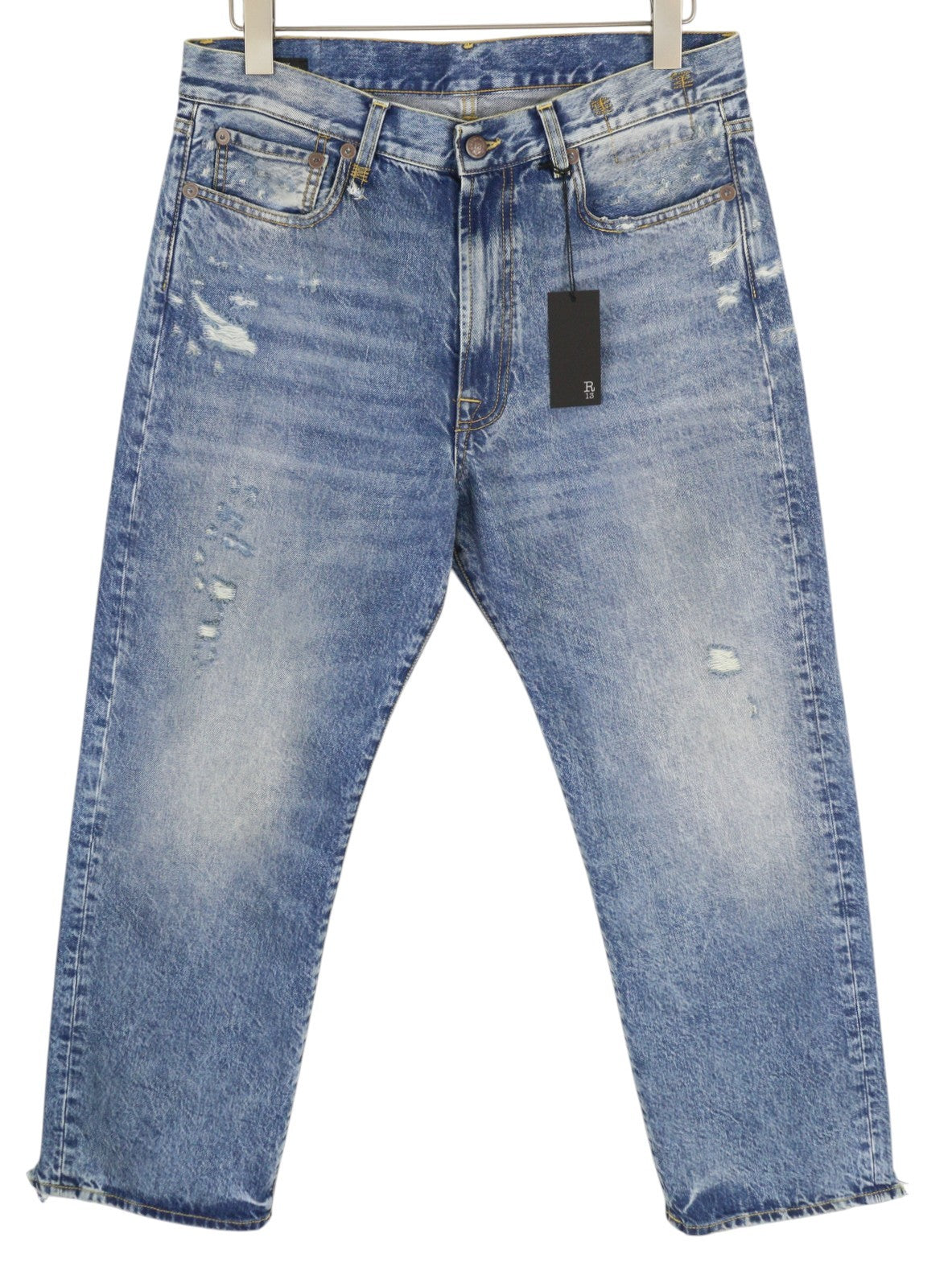 R13 „Boyfriend“ moteriškos džinsinės kelnės, 29 m., skalbti iki kulkšnies, trumpintos, „Distress Bain“ su plėšytomis kelnėmis. RMK 595 €. 