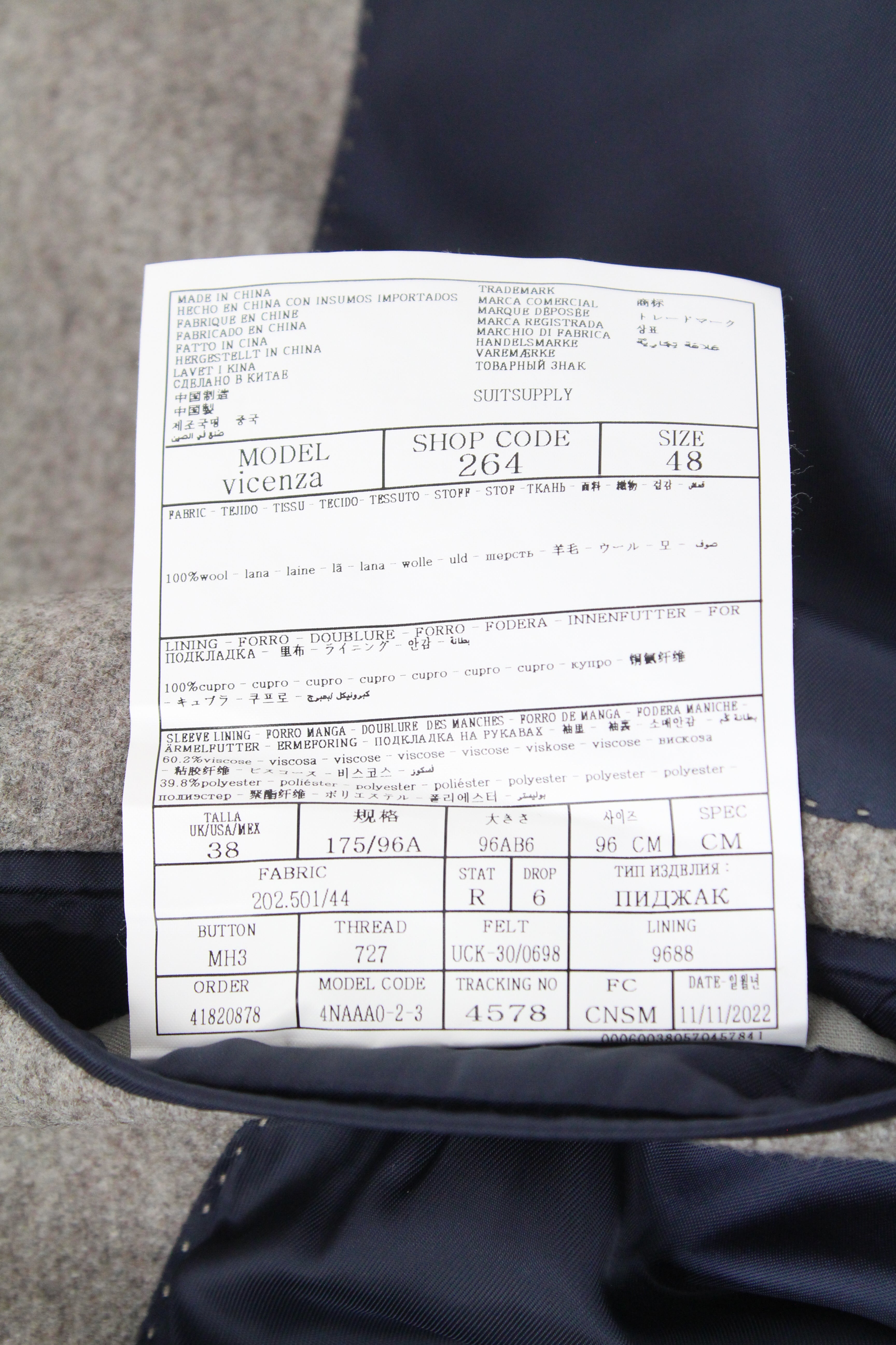 „SUITSUPPLY Vicenza“ vyriškas pilkai rudas flanelės pamušalu paltas, UK38R, dydis 