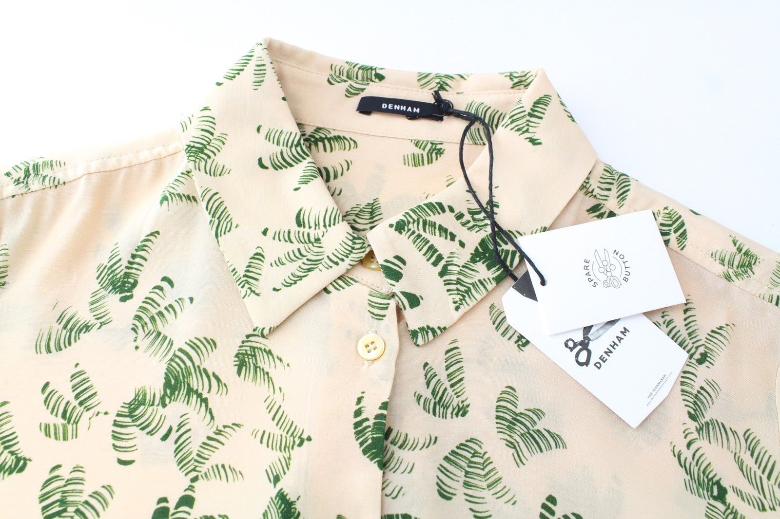 DENHAM Jessie moteriška XS dydžio oranžinė lapų rašto palaidinė su sagomis ir palmių raštu 