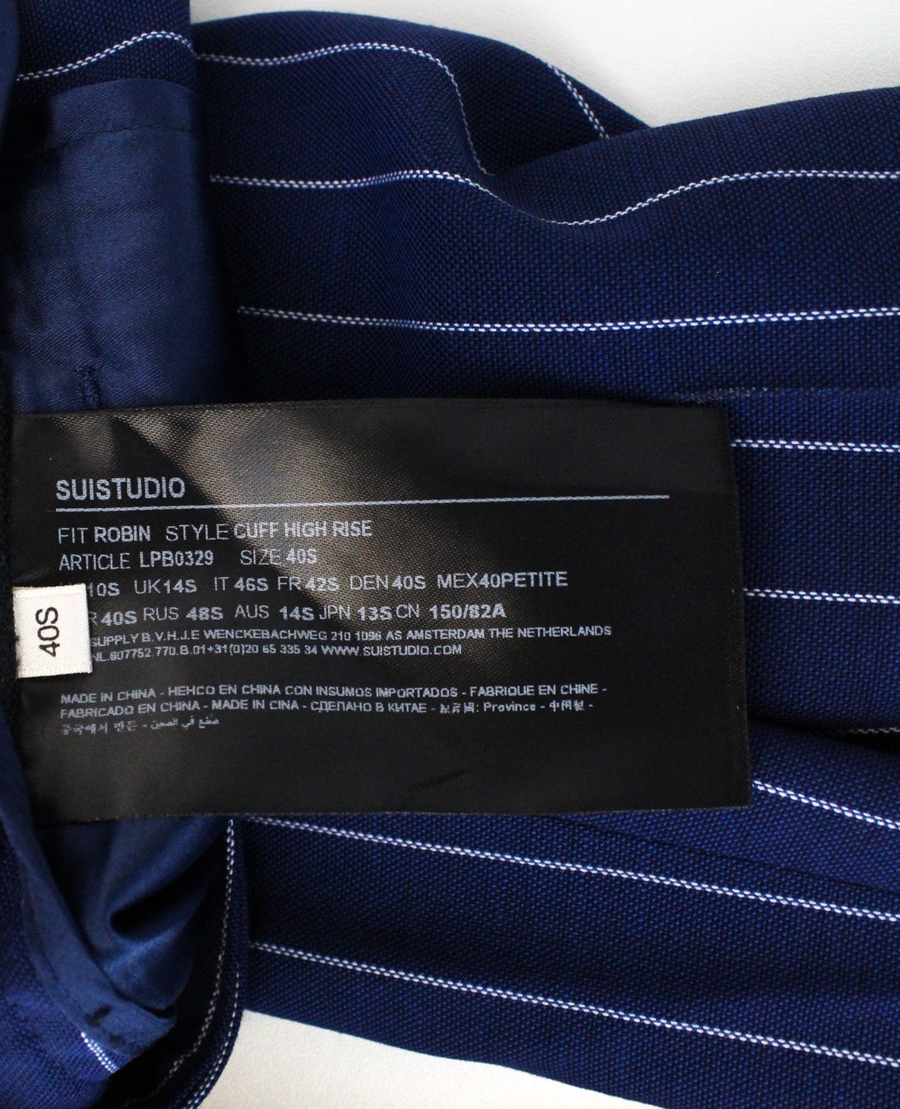 SUISTUDIO Robin UK14S moteriškos mėlynos vilnonės dryžuotos klostuotos kelnės 