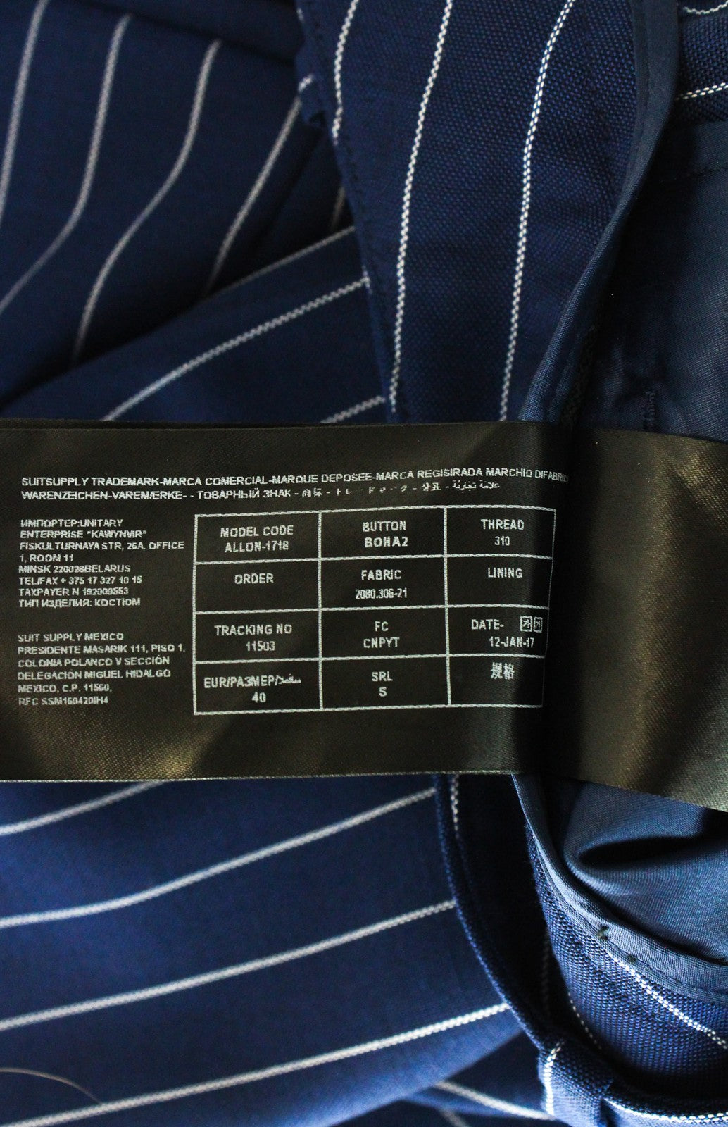 SUISTUDIO Robin UK14S moteriškos mėlynos vilnonės dryžuotos klostuotos kelnės 