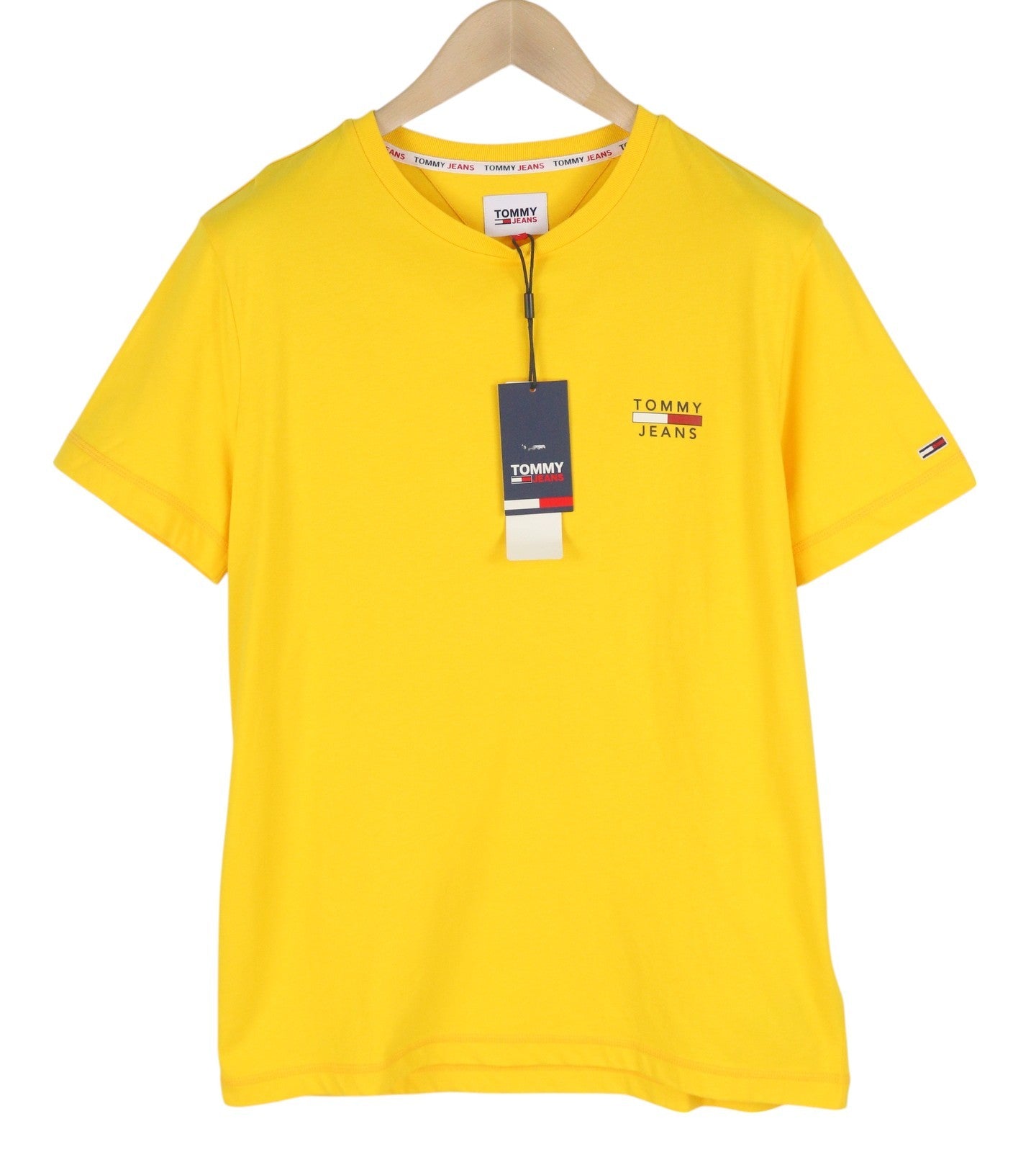 TOMMY HILFIGER TJM Chest Logo Pollen vyriški marškinėliai L dydžio, geltoni, trumpomis rankovėmis, apvalia kaklo iškirpte.