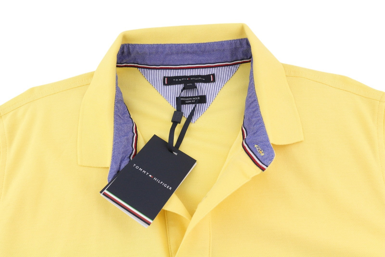 TOMMY HILFIGER vyriški 2XL dydžio geltoni „Premium Pique Slim Fit“ polo marškinėliai, rekomenduojama kaina – 80 € 