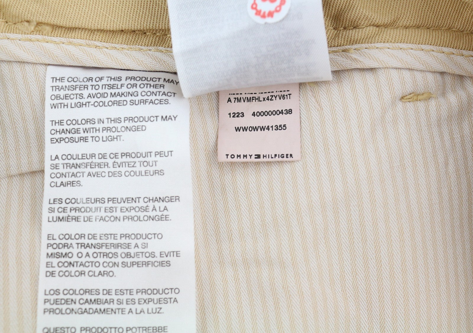 TOMMY HILFIGER moteriškos kelnės, 40 dydžio, rudos, lininio mišinio, platėjančiomis klešnėmis, klostuotos. Rekomenduojama mažmeninė kaina – 196 €. 