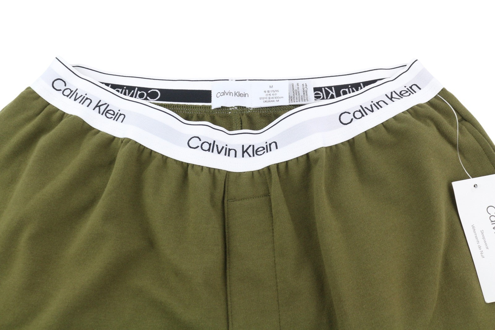 CALVIN KLEIN vyriškos kelnės M žalios jogger stiliaus su elastingu juosmeniu ir kišenėmis trikotažinio audinio tamprumu 