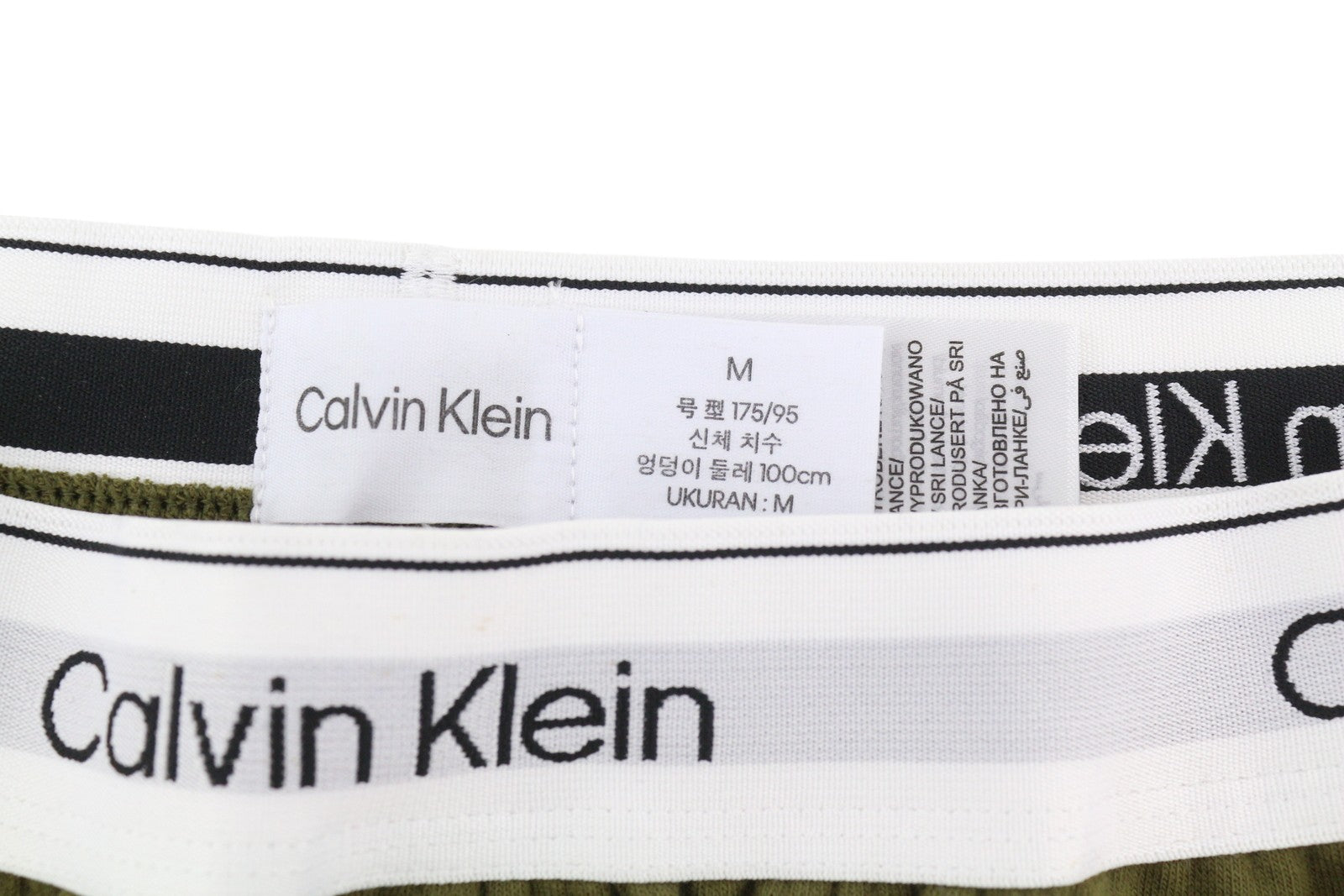 CALVIN KLEIN vyriškos kelnės M žalios jogger stiliaus su elastingu juosmeniu ir kišenėmis trikotažinio audinio tamprumu 