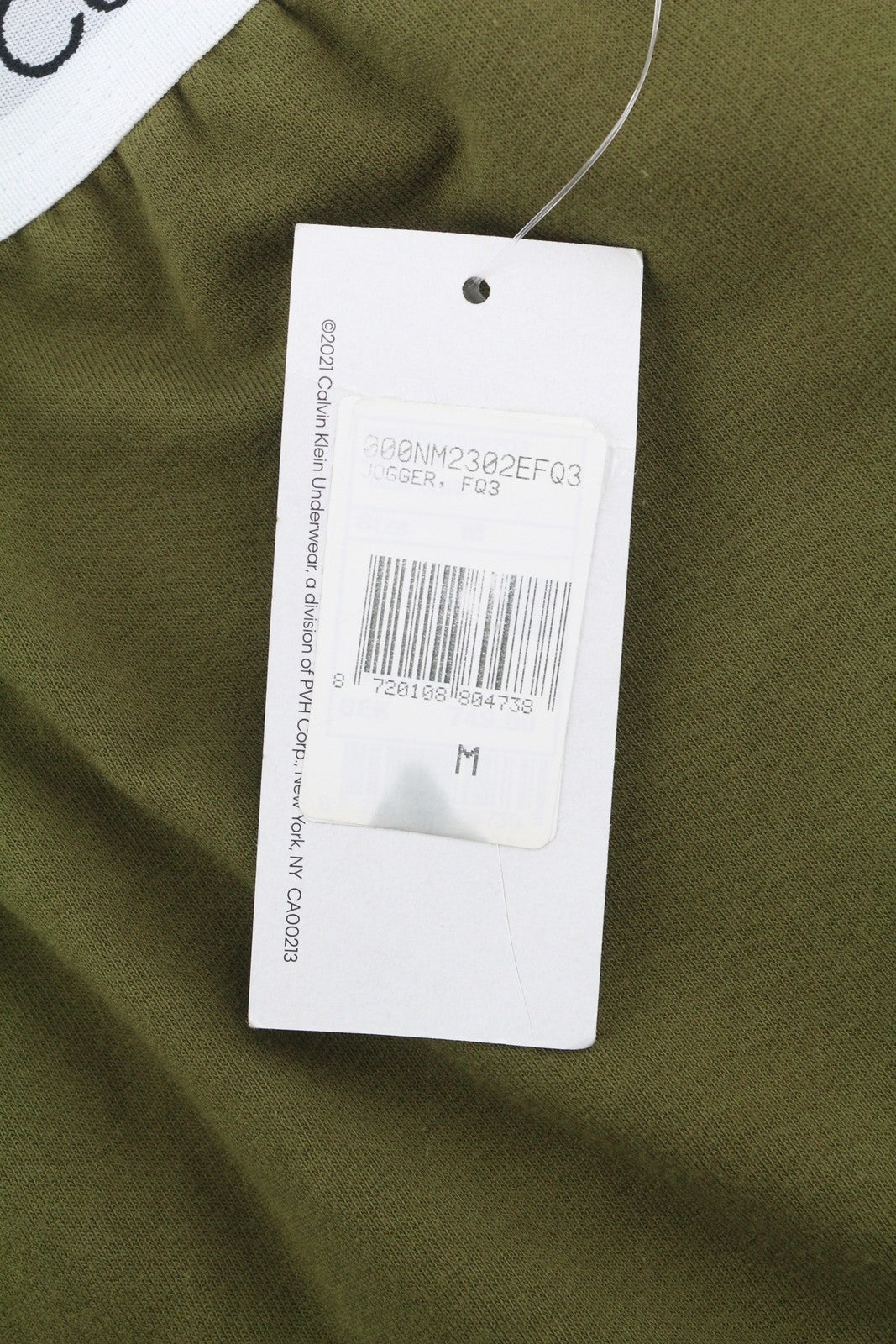 CALVIN KLEIN vyriškos kelnės M žalios jogger stiliaus su elastingu juosmeniu ir kišenėmis trikotažinio audinio tamprumu 