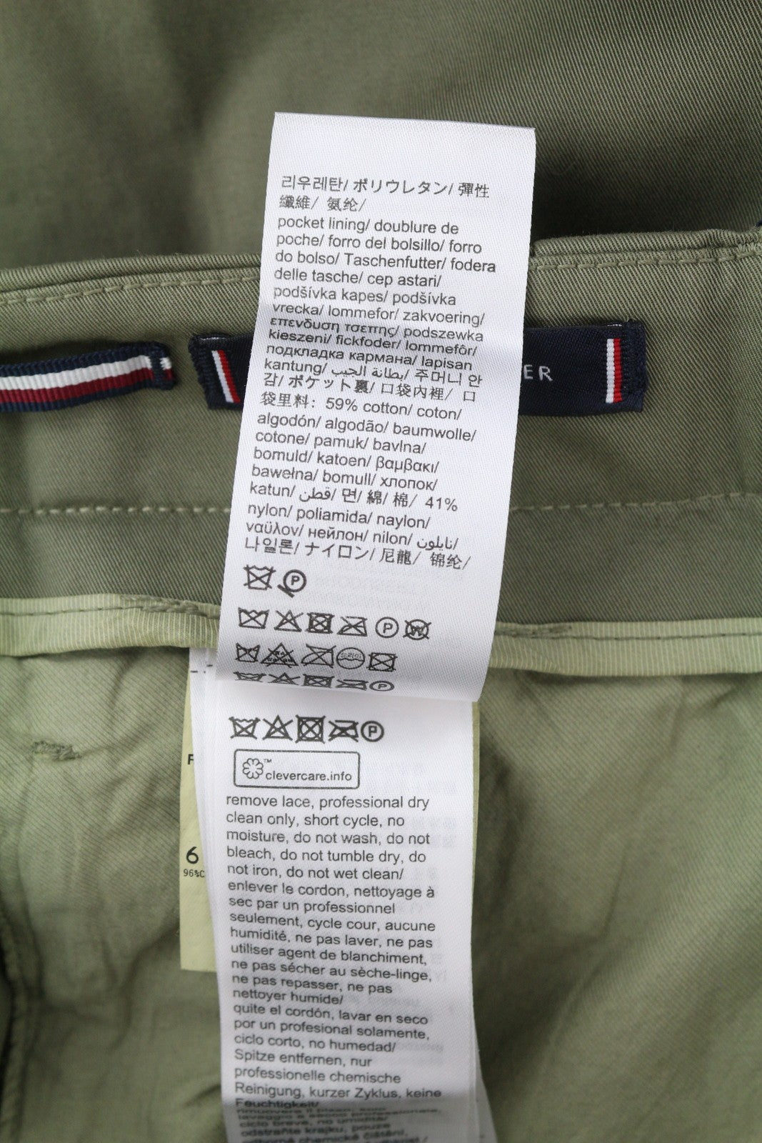 TOMMY HILFIGER Army Stretch Twill vyriškos kelnės W32 Khaki spalvos, klostuotos, siaurėjančios su užtrauktuku. 