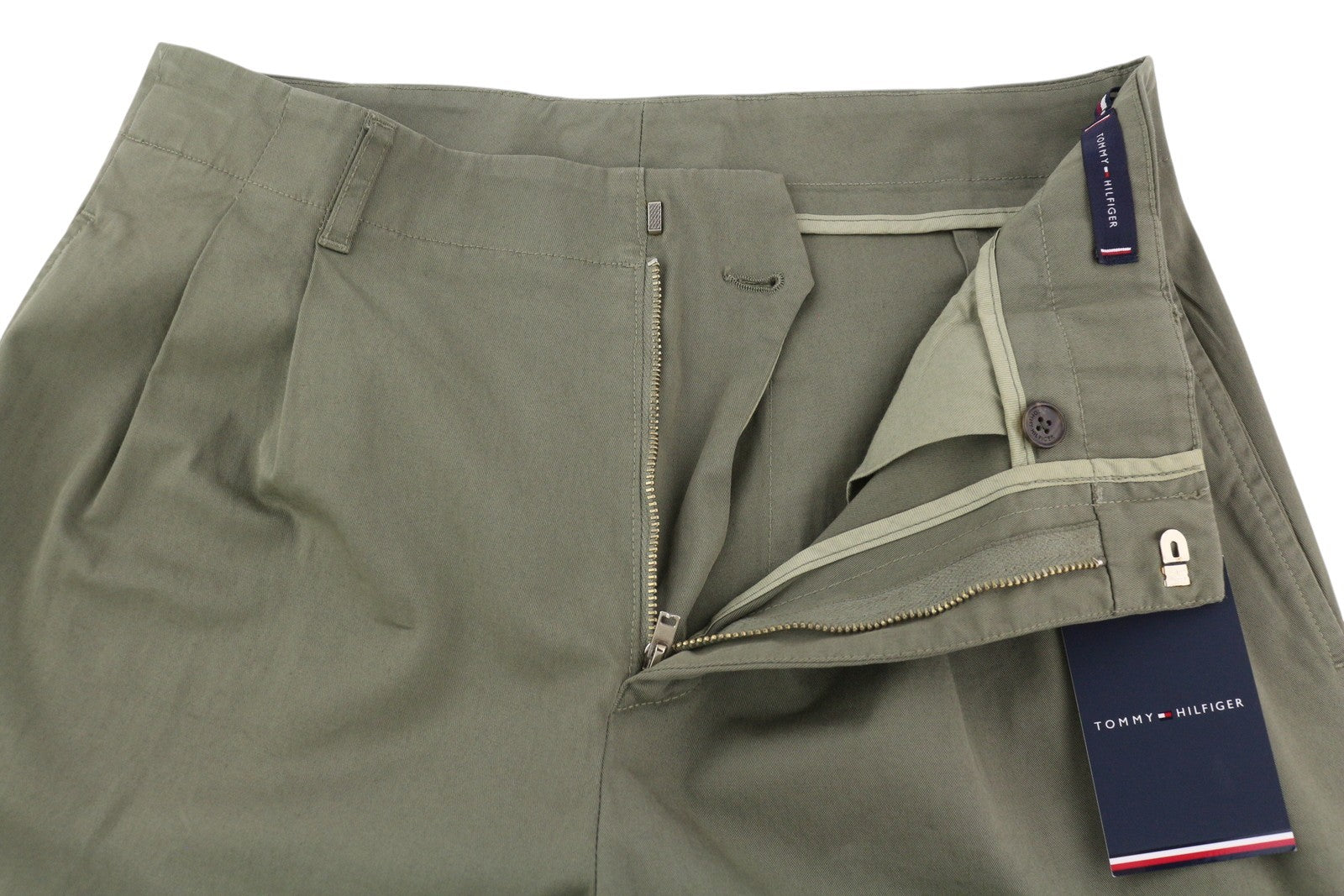 TOMMY HILFIGER Army Stretch Twill vyriškos kelnės W32 Khaki spalvos, klostuotos, siaurėjančios su užtrauktuku. 