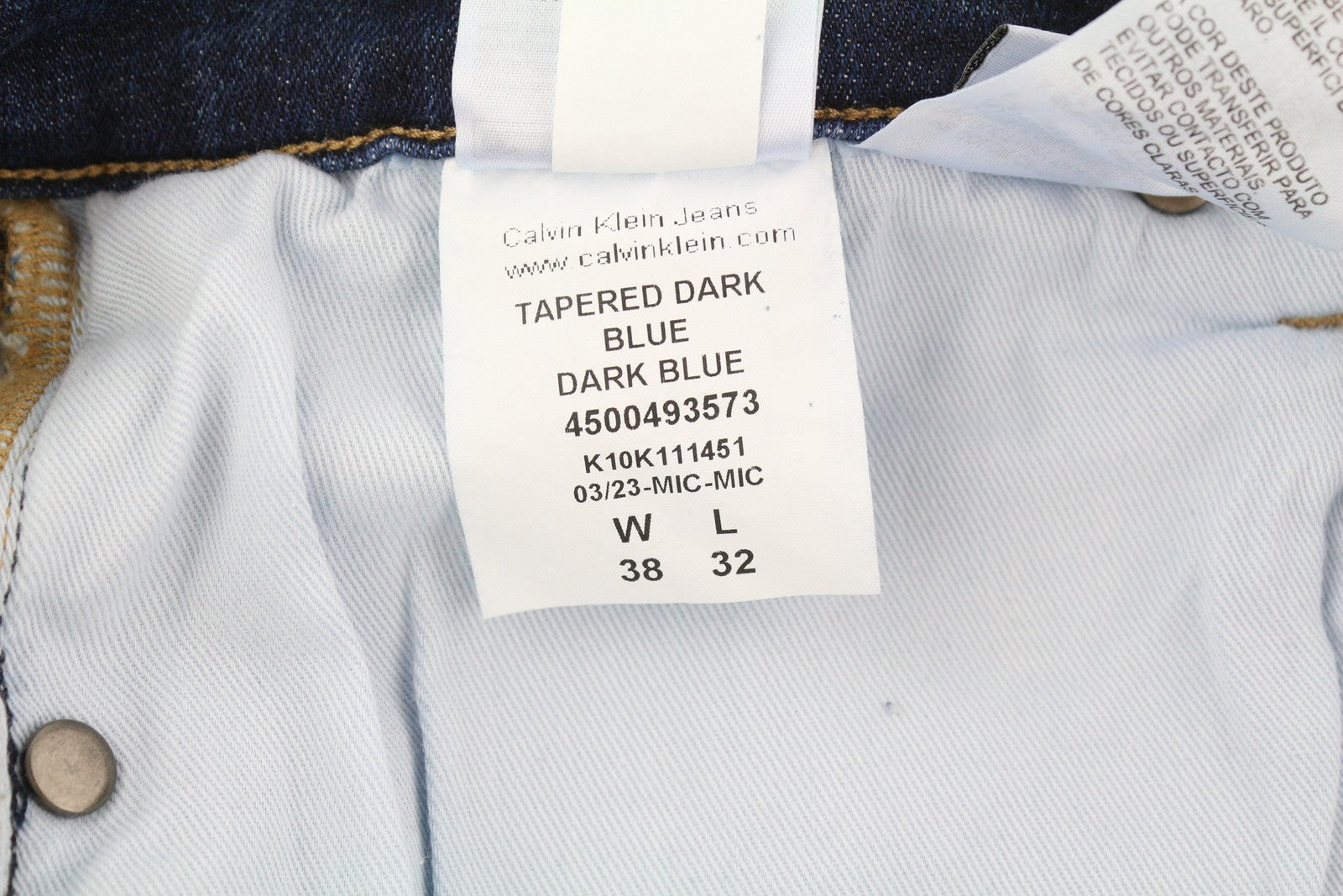 CALVIN KLEIN siaurėjantys tamsiai mėlyni vyriški džinsai W38/L32 tamprūs užtrauktuku su kišenėmis džinsinis audinys 