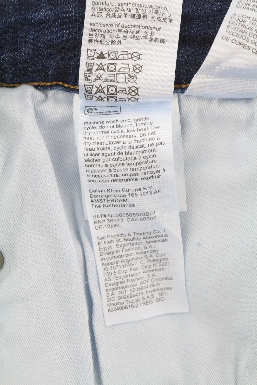 CALVIN KLEIN siaurėjantys tamsiai mėlyni vyriški džinsai W38/L32 tamprūs užtrauktuku su kišenėmis džinsinis audinys 