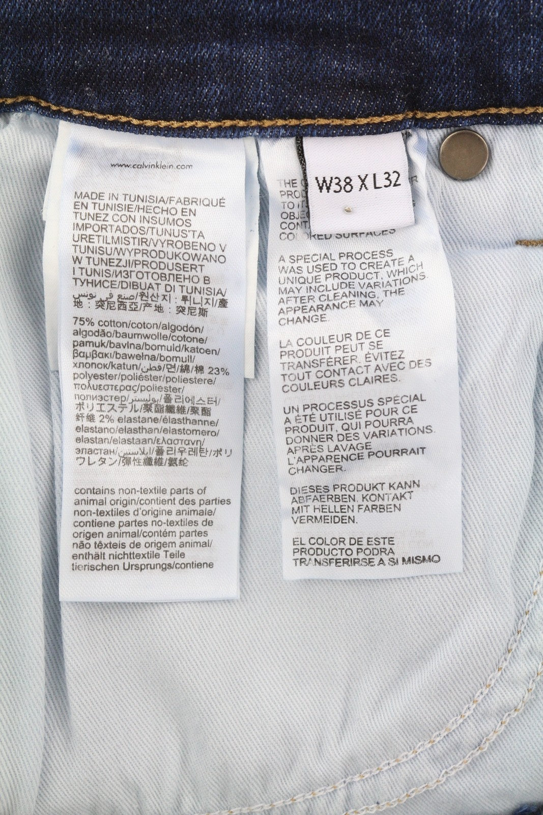 CALVIN KLEIN siaurėjantys tamsiai mėlyni vyriški džinsai W38/L32 tamprūs užtrauktuku su kišenėmis džinsinis audinys 