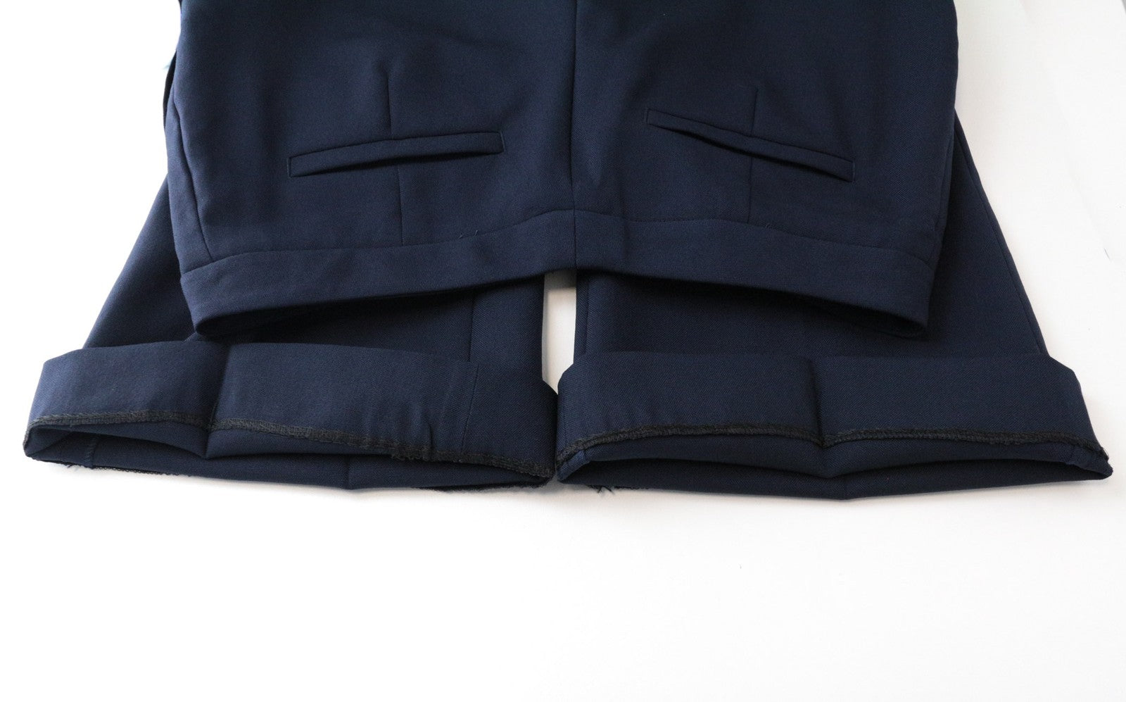 SUISTUDIO Robin moteriškos kelnės UK12R tamsiai mėlynos, plonos, platėjančios moheros, plokščia priekine dalimi 