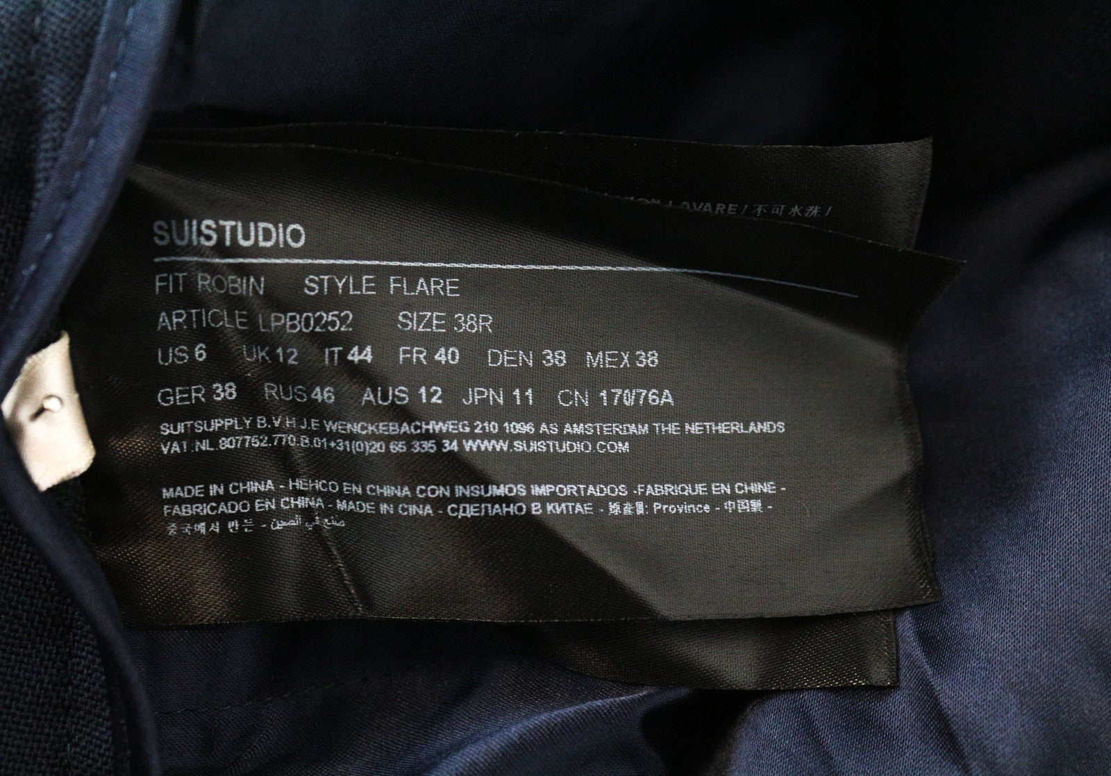 SUISTUDIO Robin moteriškos kelnės UK12R tamsiai mėlynos, plonos, platėjančios moheros, plokščia priekine dalimi 