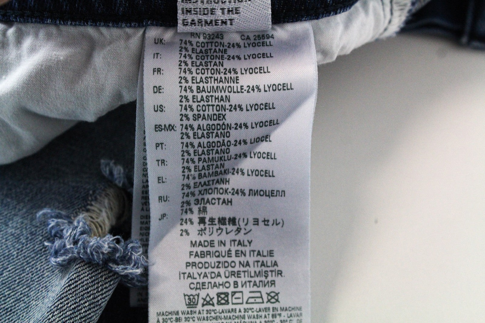 DIESEL Buster 081AQ vyriškos džinsinės kelnės W29/L32 su dirbtinės odos raštu, mėlynos, plonos, tamprios, siaurėjančios. 