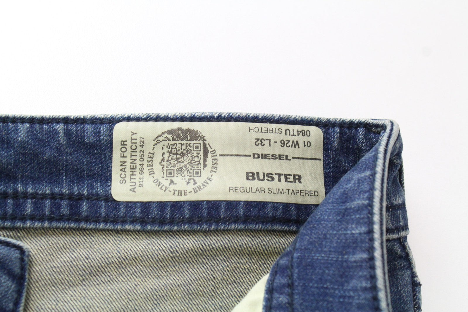 DIESEL Buster 084UT vyriškos džinsinės kelnės W26/L32 mėlynos, plonos, elastingos, siaurėjančios 