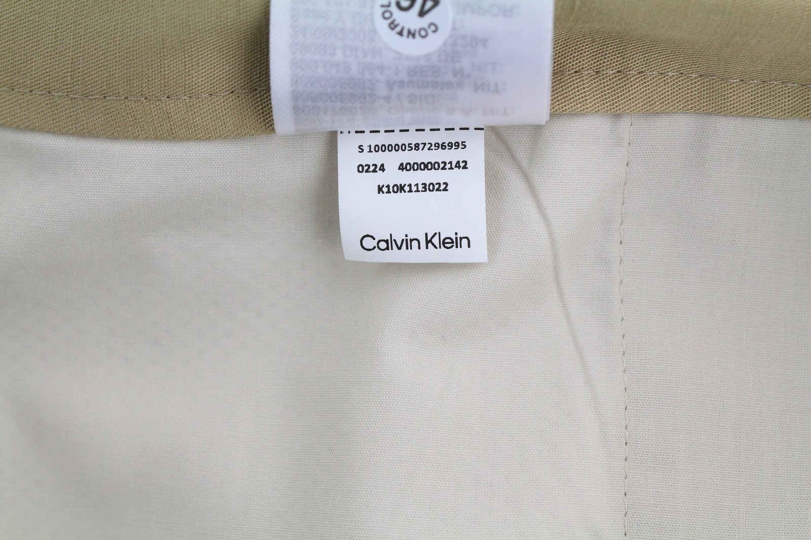 CALVIN KLEIN Piece Dyed Tencel siaurėjančios vyriškos kelnės W40/L32 rudos lino mišinio 