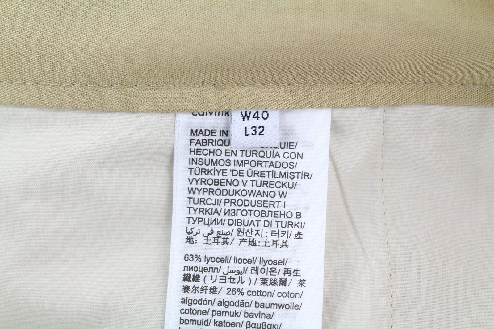 CALVIN KLEIN Piece Dyed Tencel siaurėjančios vyriškos kelnės W40/L32 rudos lino mišinio 