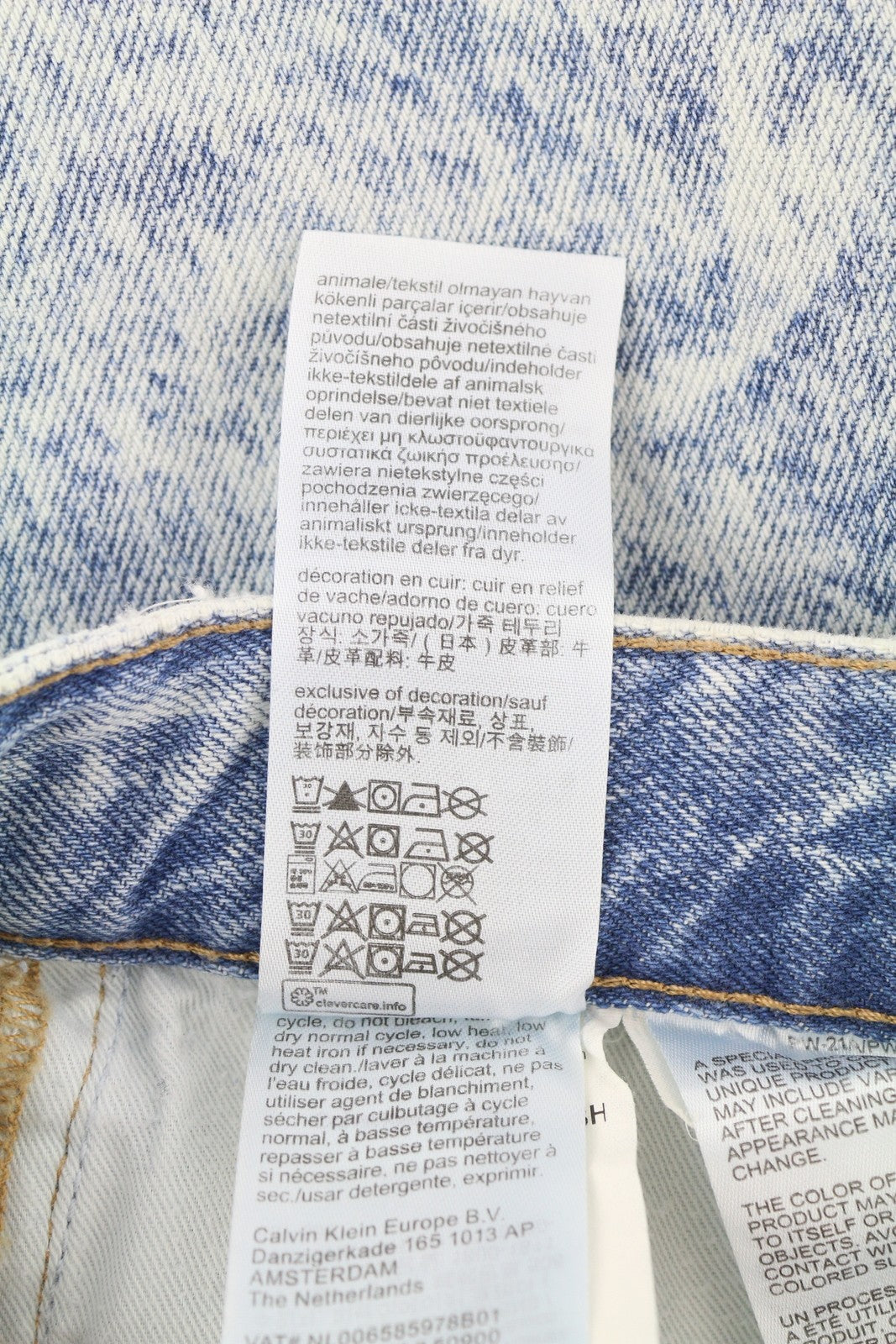 CALVIN KLEIN 90-ųjų tiesūs vyriški džinsai W31 išblukintos mėlynos spalvos su užtrauktuku ir logotipu, rekomenduojama kaina – 119 € 