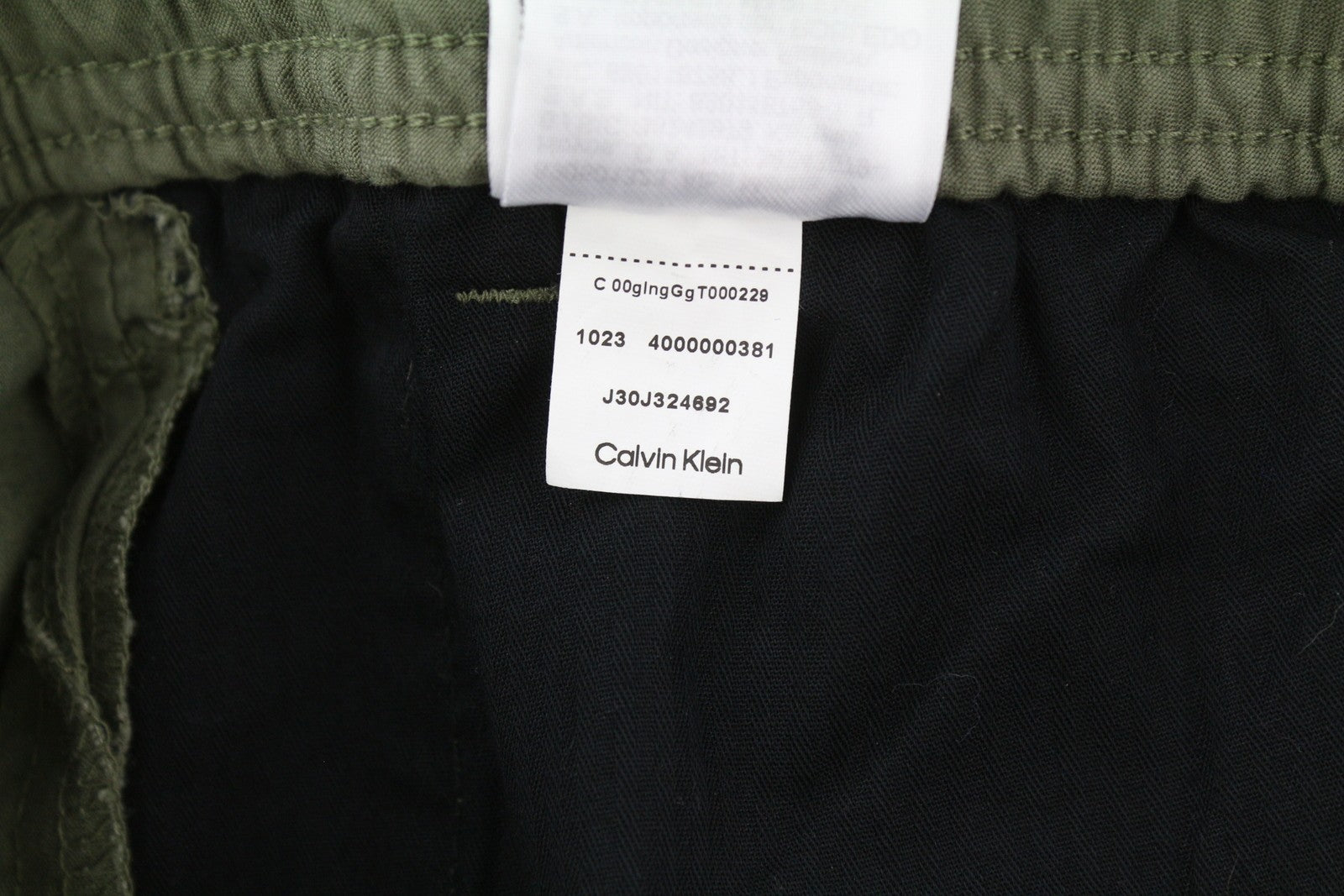 CALVIN KLEIN Essential Regular vyriškos kelnės, XL dydžio, žalios, su elastingu juosmeniu ir logotipu.