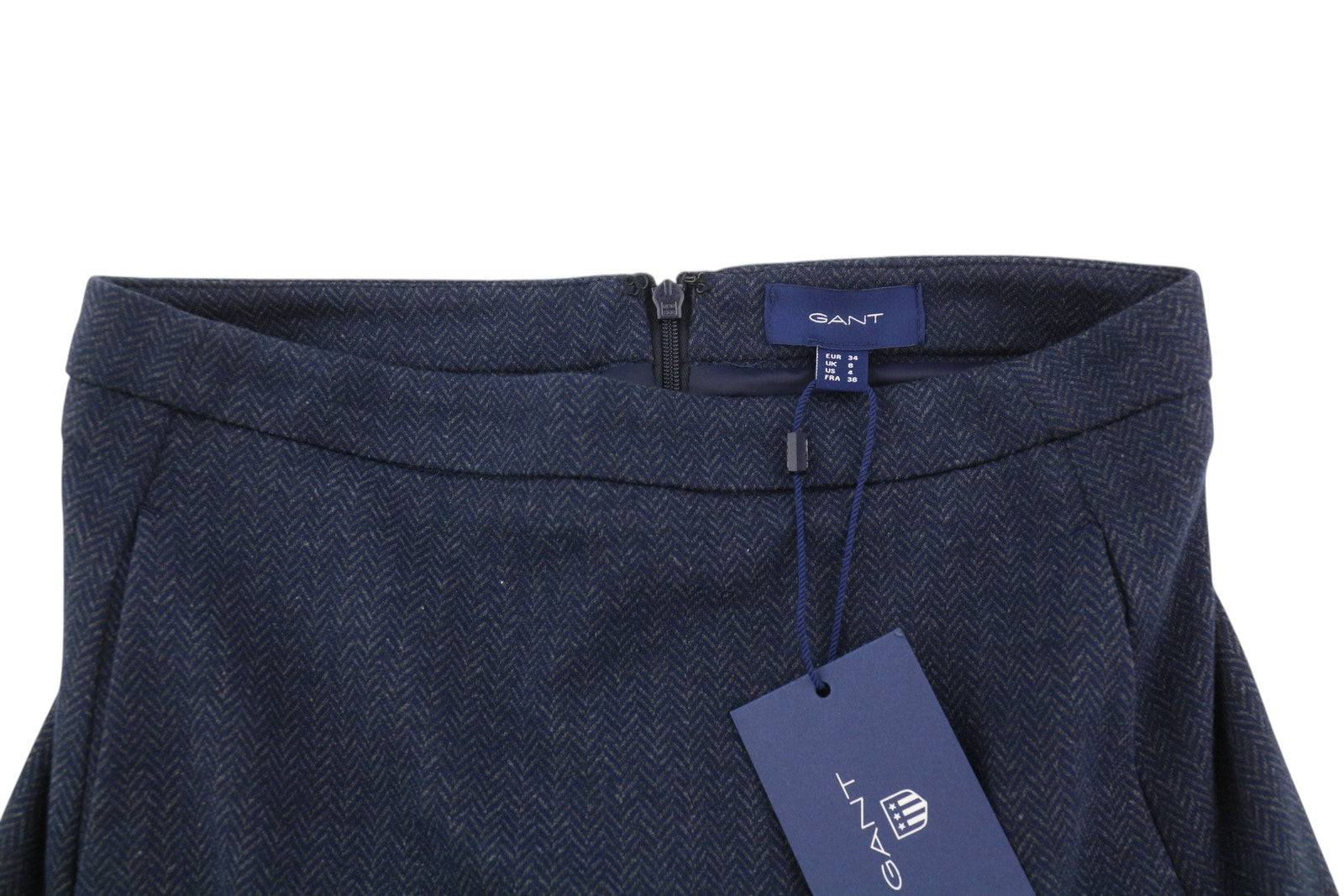 GANT moteriškas sijonas su „Herringbone“ raštu, 34 dydžio, mėlynas, su kišenėmis, užtrauktuku ir pamušalu, raštuotas mini sijonas. 