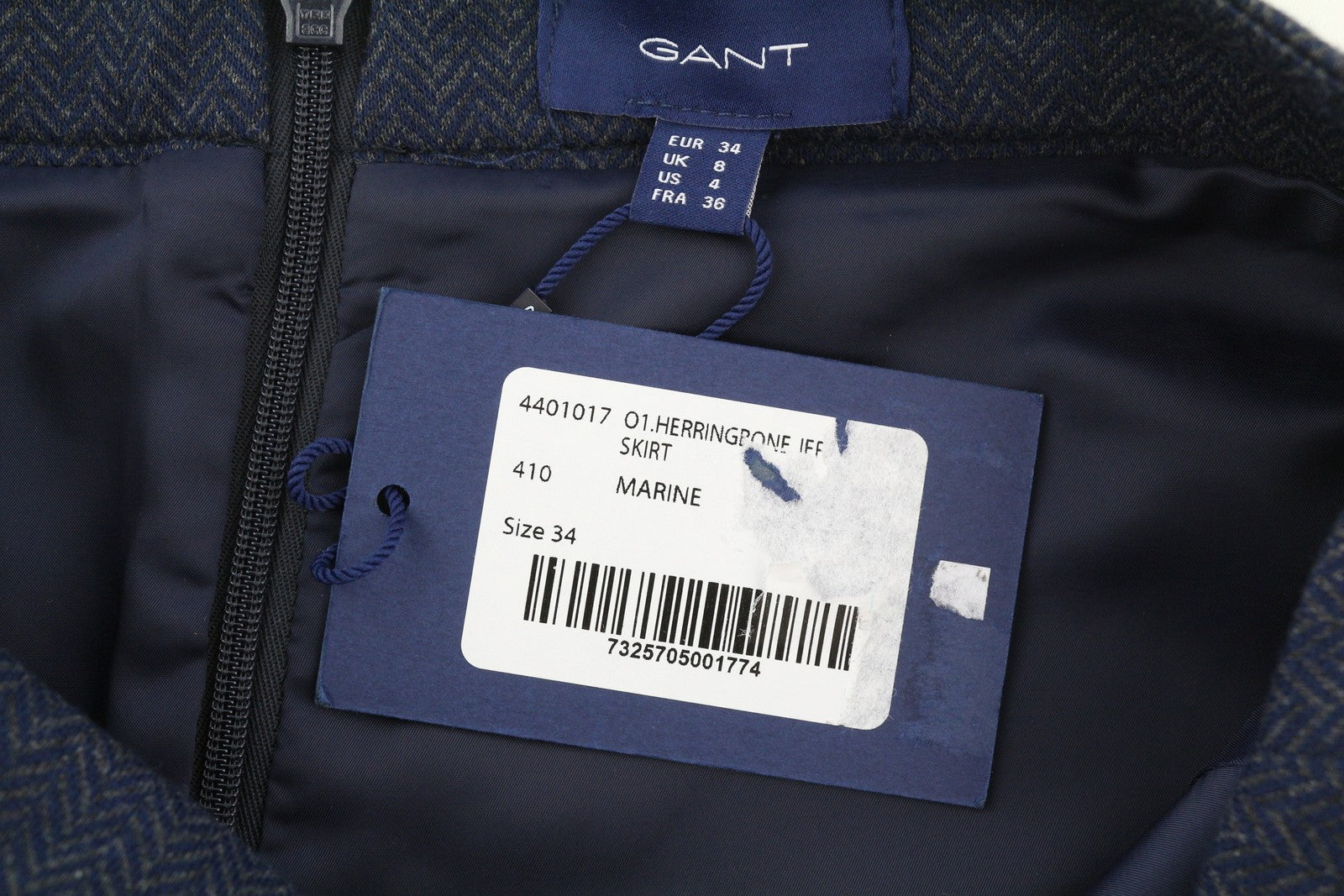 GANT moteriškas sijonas su „Herringbone“ raštu, 34 dydžio, mėlynas, su kišenėmis, užtrauktuku ir pamušalu, raštuotas mini sijonas. 