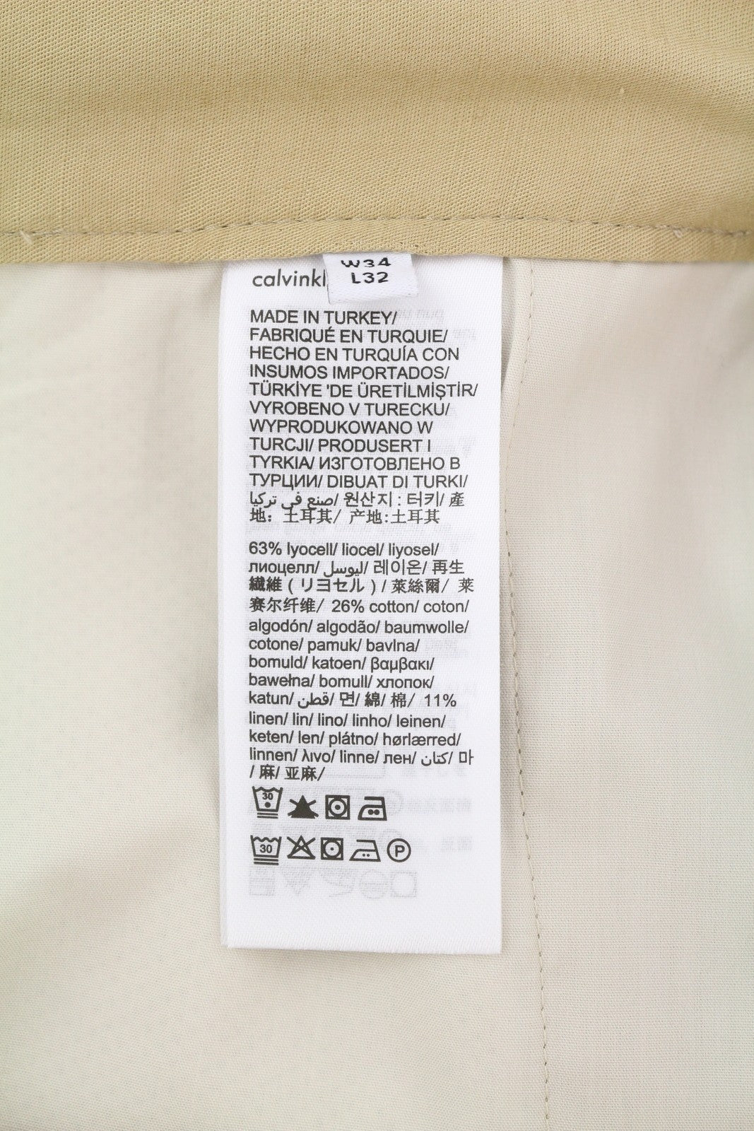 CALVIN KLEIN Piece Dyed Tencel siaurėjančios vyriškos kelnės W34/L32 rudos lino mišinio 