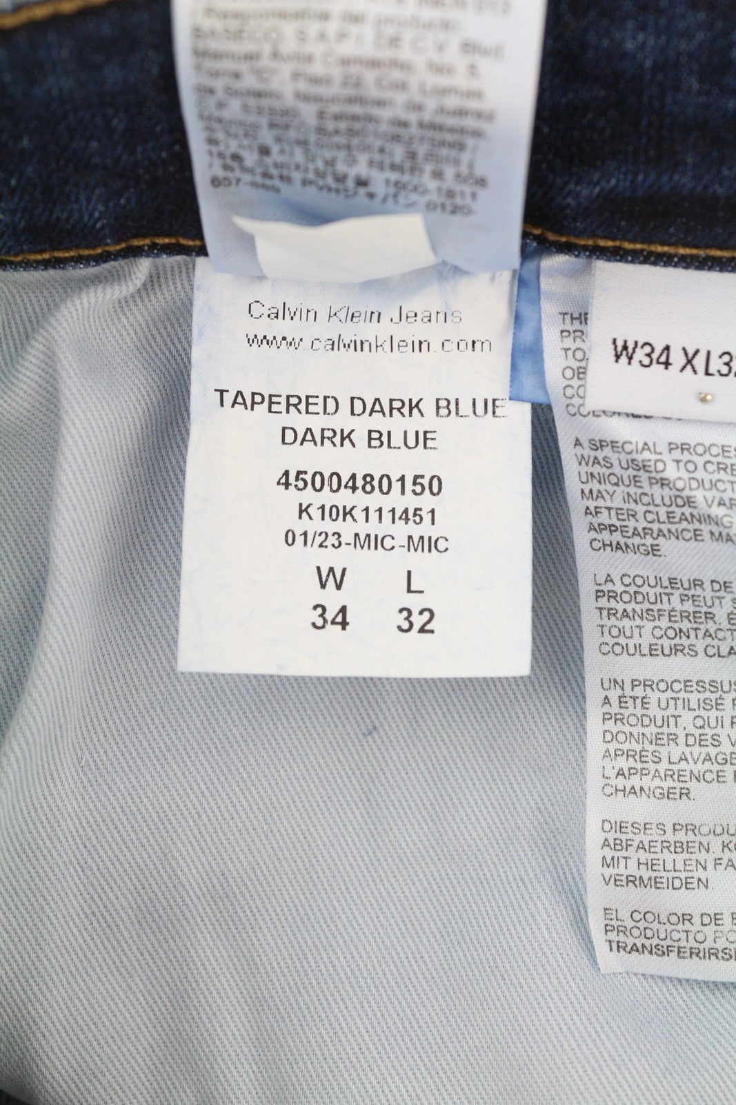 CALVIN KLEIN vyriški džinsai W34/L32 tamsiai mėlyni siaurėjantys tamprūs užtrauktukai su logotipu ir džinsiniu logotipu 