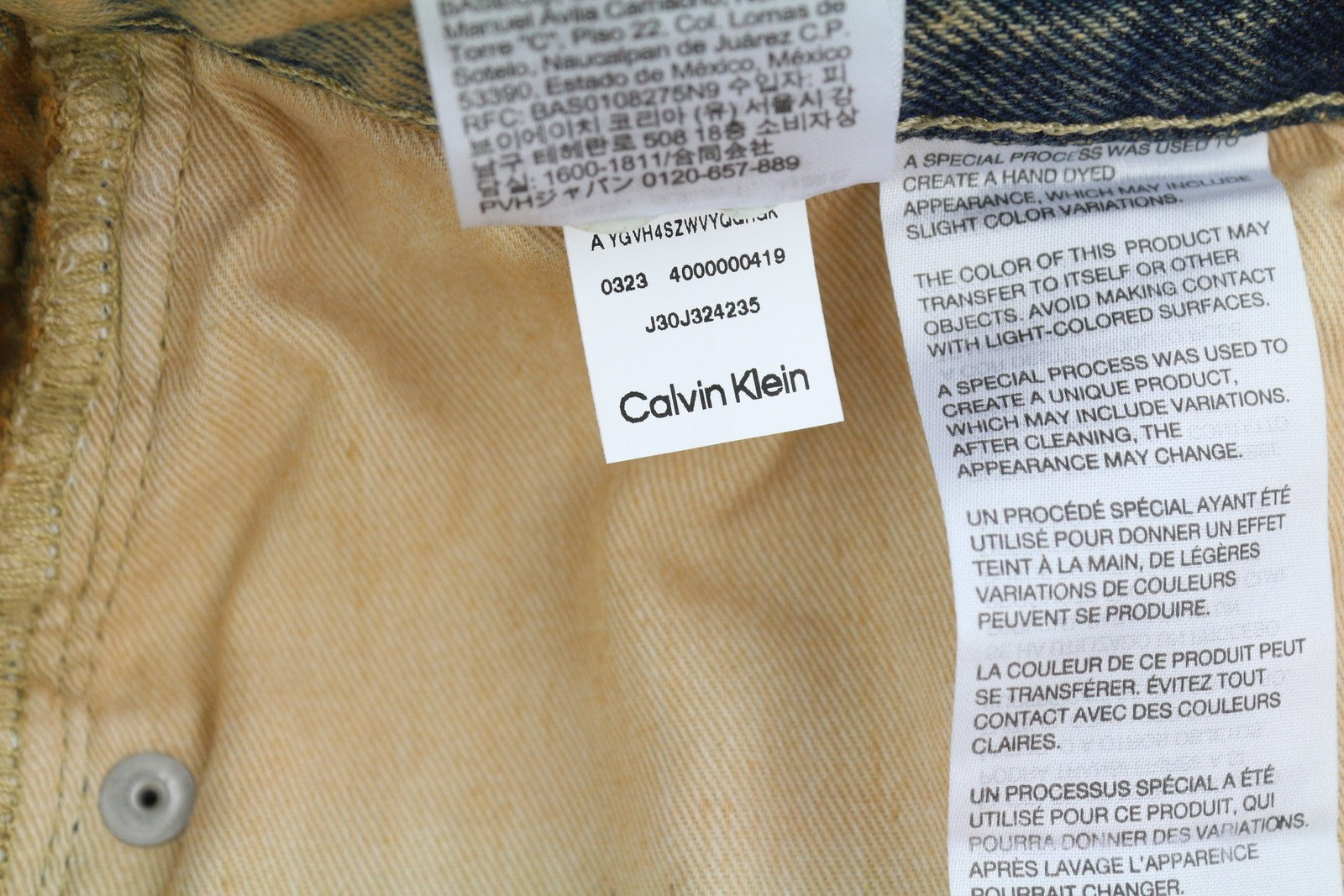 CALVIN KLEIN 90-ųjų tiesūs vyriški džinsai W31 išblukintos rudos spalvos su užtrauktuku ir logotipu, rekomenduojama kaina – 119 € 