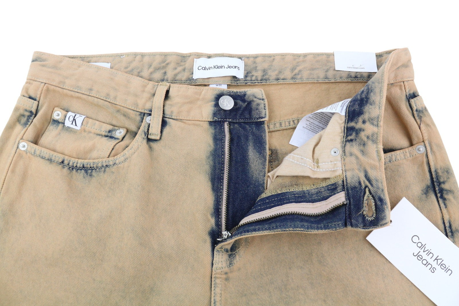 CALVIN KLEIN 90-ųjų tiesūs vyriški džinsai W31 išblukintos rudos spalvos su užtrauktuku ir logotipu, rekomenduojama kaina – 119 € 