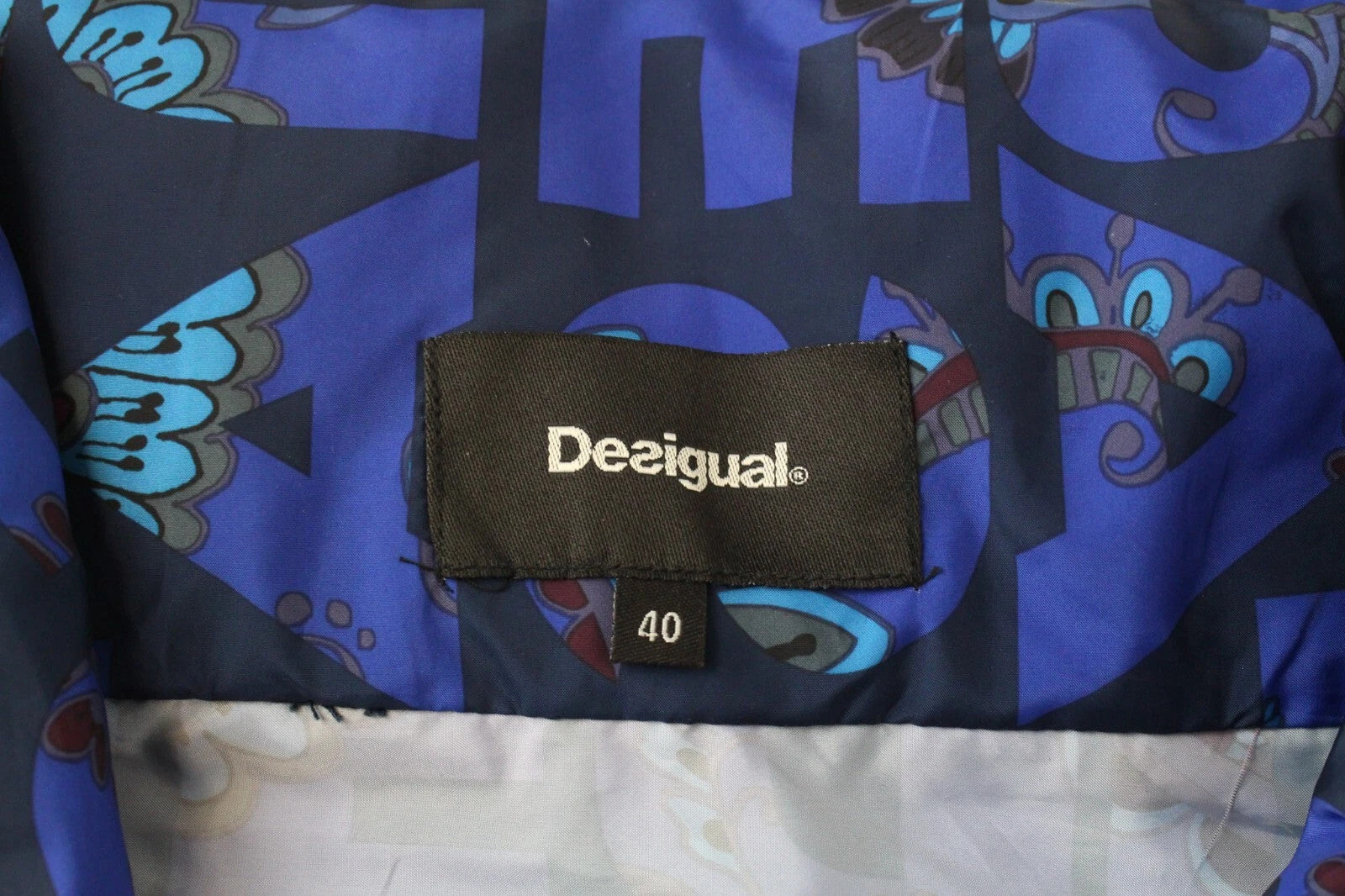 DESIGUAL Lex moteriška UK12 užtrauktuku mėlyna raštuota lengva striukė su gobtuvu 