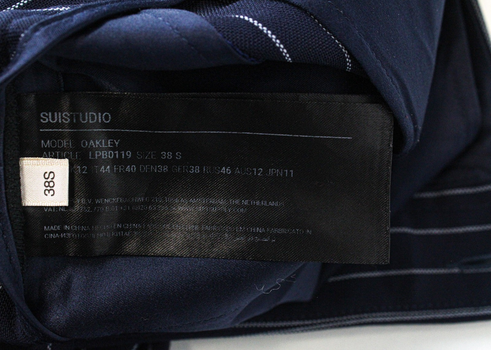 SUISTUDIO Oakley moteriškos kelnės UK12S tamsiai mėlynos dryžuotos grynos vilnos klostuotos kelnės 