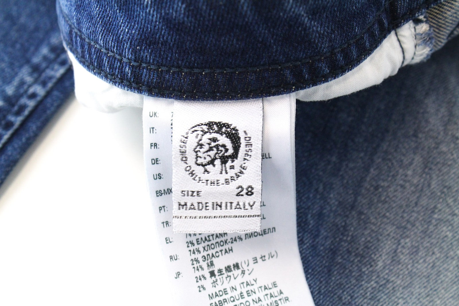 DIESEL Buster 081AQ vyriški mėlyni, siaurėjantys, plėšyti medvilniniai tamprūs džinsai W28/L32 