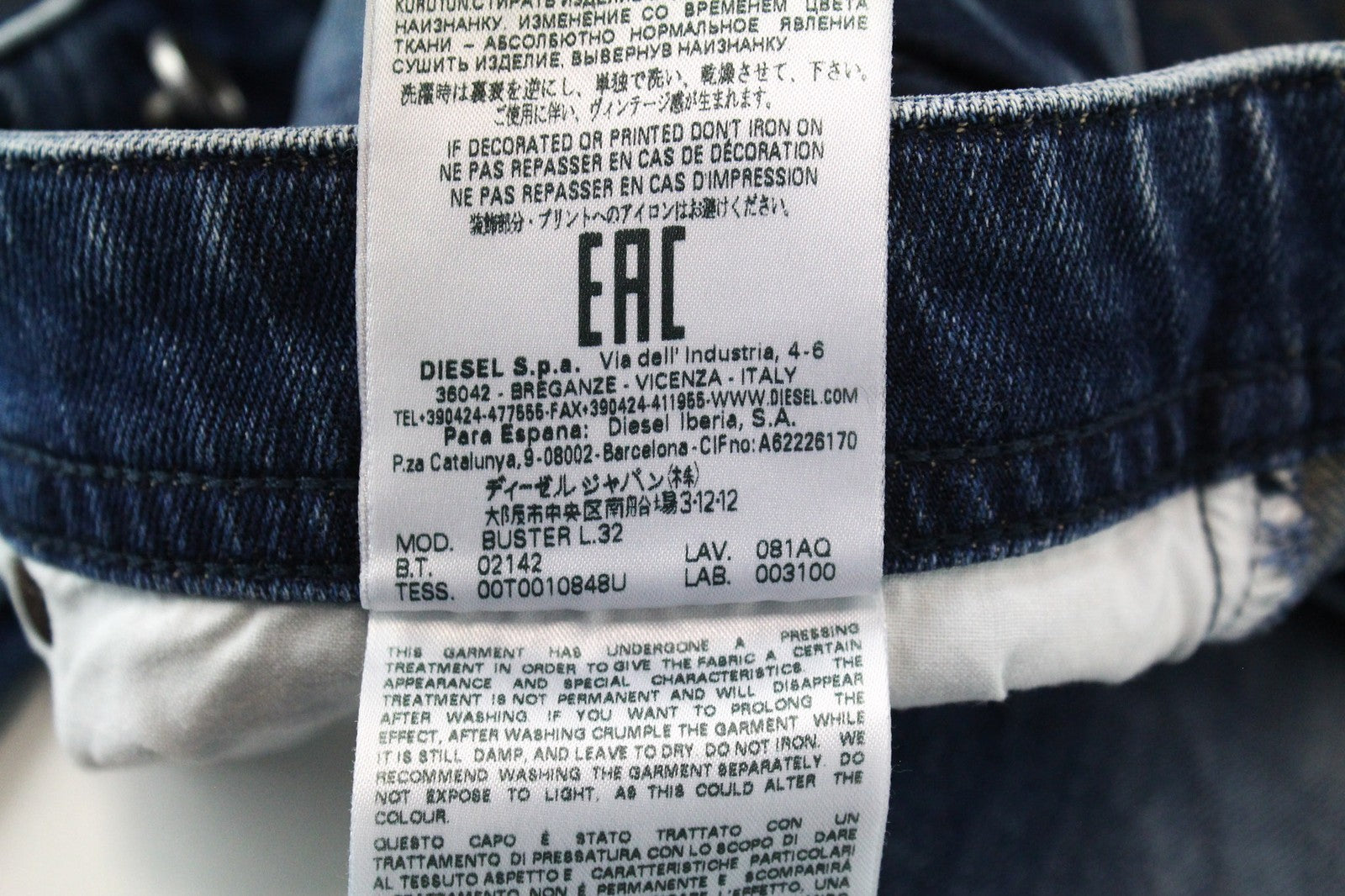 DIESEL Buster 081AQ vyriški mėlyni, siaurėjantys, plėšyti medvilniniai tamprūs džinsai W28/L32 