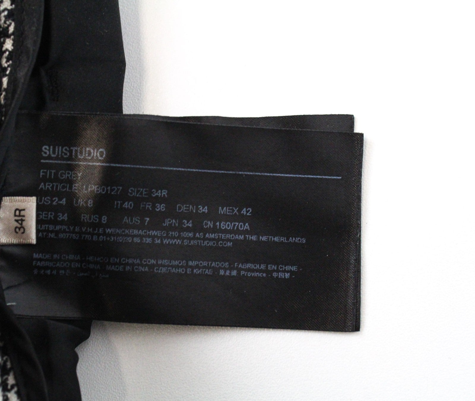 SUISTUDIO pilkos moteriškos kelnės UK8R vilnos, šilko, lino, prigludusios, pilkos, „Houndstooth“ rašto. 