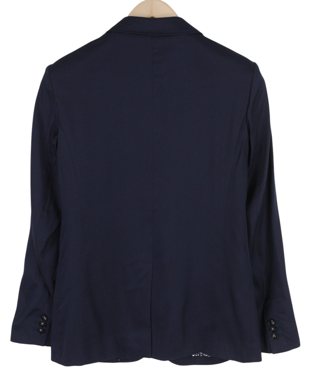 GANT Drapy Twill moteriškas švarkas su tamsiai mėlyna spalva, vieneiliu pamušalu ir įpjovomis ant atvarto. 