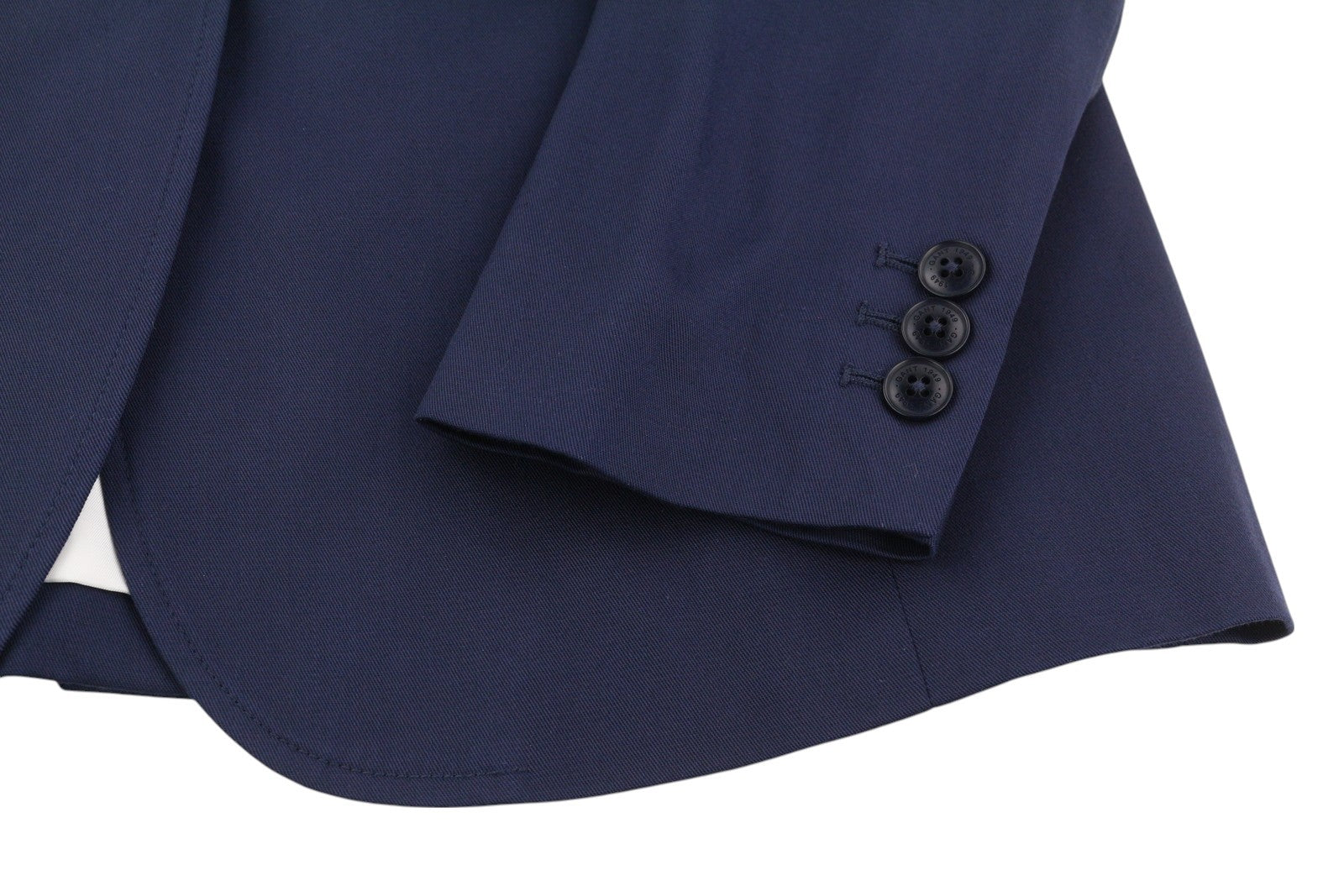 GANT Drapy Twill moteriškas švarkas su tamsiai mėlyna spalva, vieneiliu pamušalu ir įpjovomis ant atvarto. 