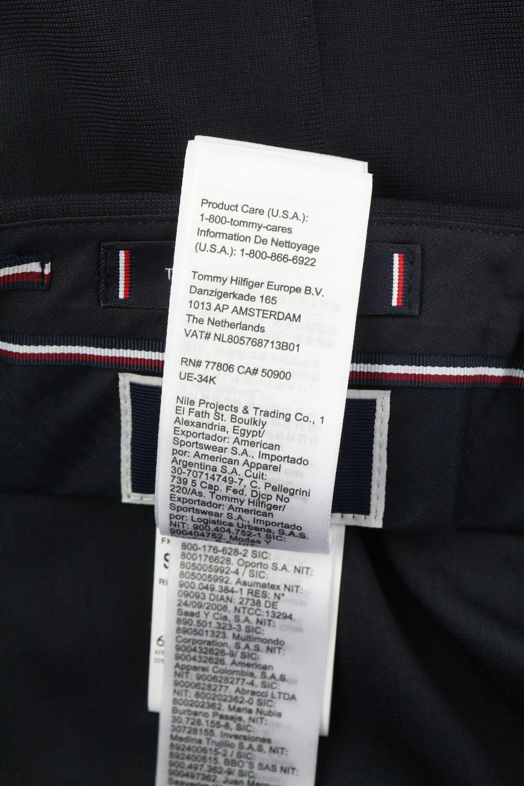 TOMMY HILFIGER vyriškos kelnės, 48 ​​dydžio, tamsiai mėlynos, THFlex vilnos mišinio, plonos, plokščios priekinės dalies. 