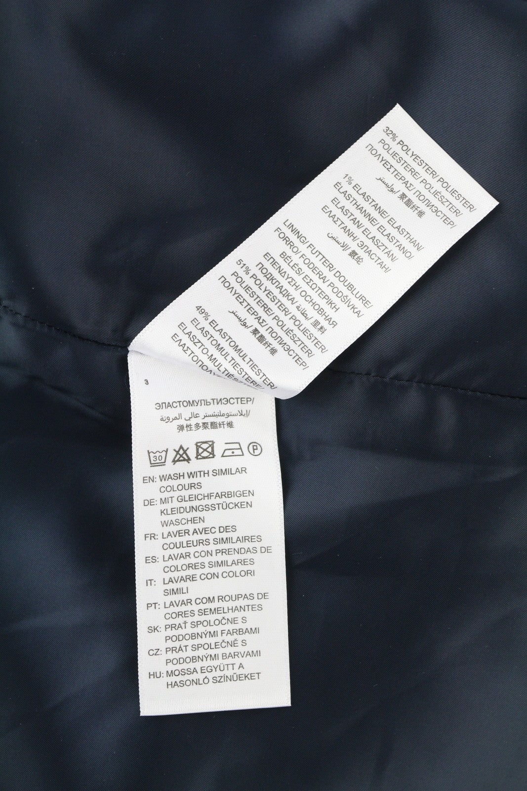 GANT skalbiamas tamprus vilnonis moteriškas sijonas, tamsiai mėlynas, su klostėmis ir pamušalu, iki kelių 