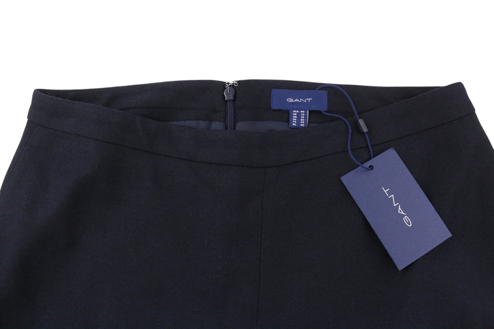 GANT skalbiamas tamprus vilnonis moteriškas sijonas, tamsiai mėlynas, su klostėmis ir pamušalu, iki kelių 