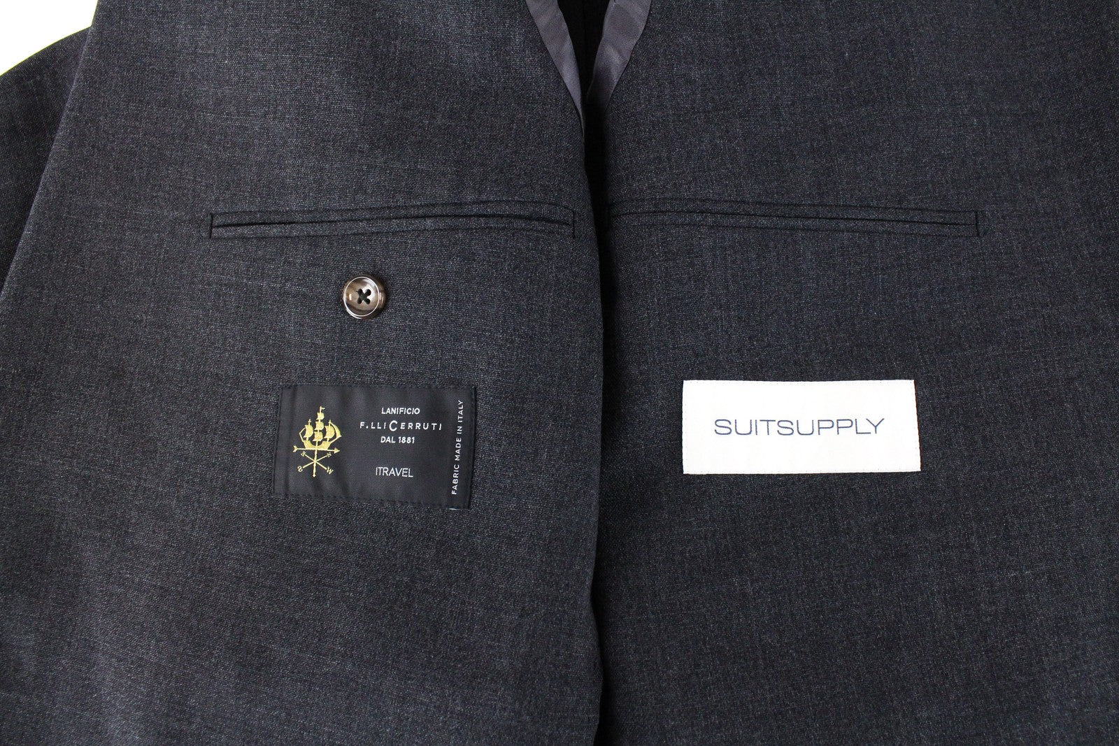 SUITSUPPLY La Spalla vyriškas kostiumas UK44S be pamušalo, vienaeilis, pilkas, 2 dalių vilnonis 