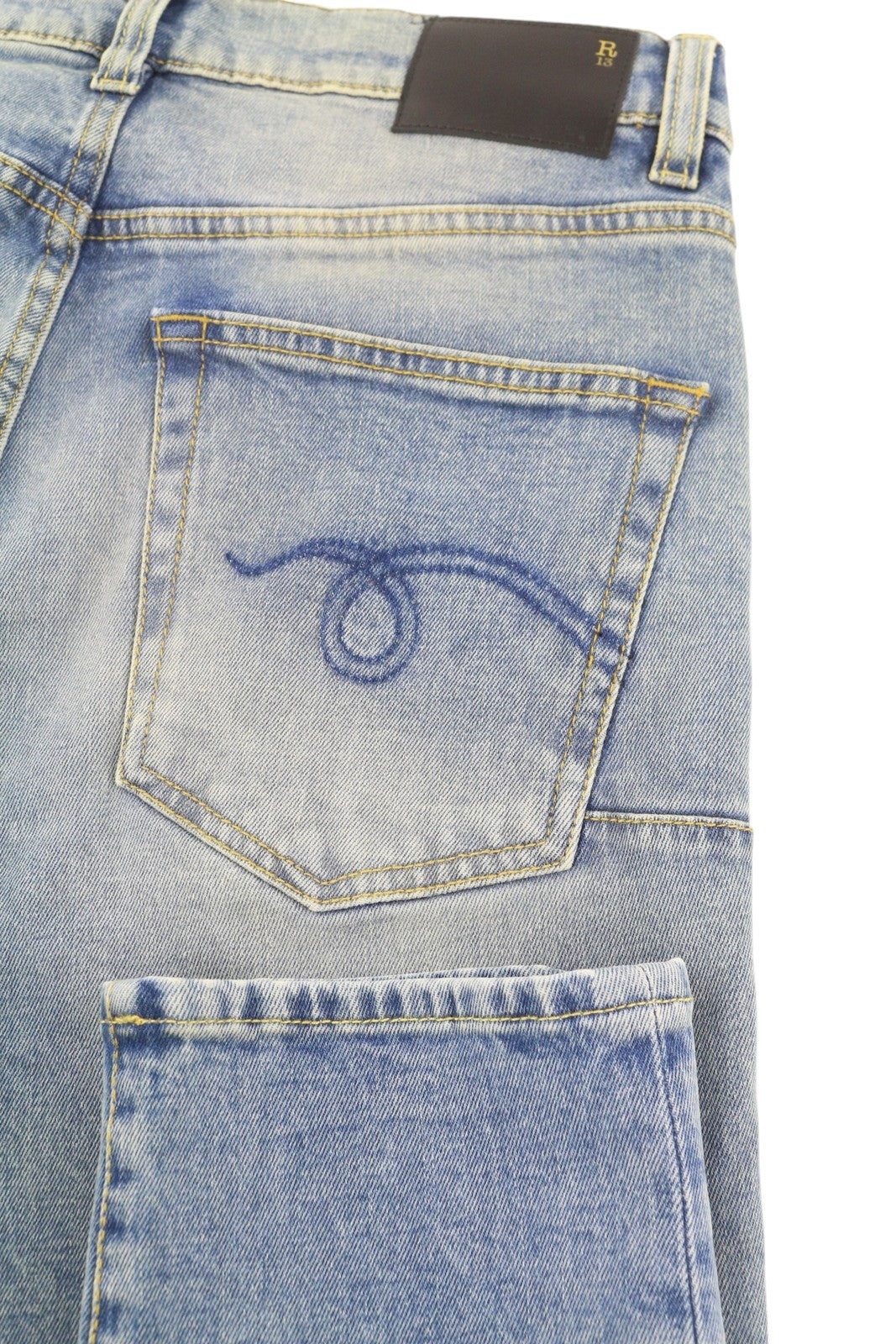 R13 Skate stiliaus vyriški džinsai, 33 dydis, Jasper tamprūs, aptempti, skalbtos mėlynos spalvos su išblukusiu logotipu. RMK 440 €. 