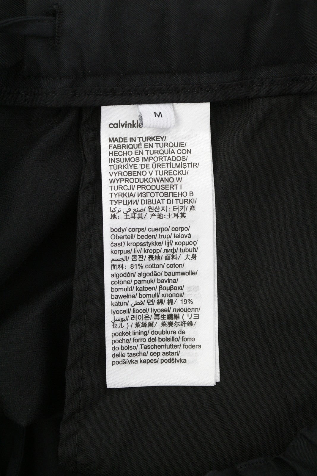 CALVIN KLEIN medvilninės „Seacell“ modernios vyriškos kelnės M, juodos, klostuotos chino kelnės, rekomenduojama kaina – 139 € 