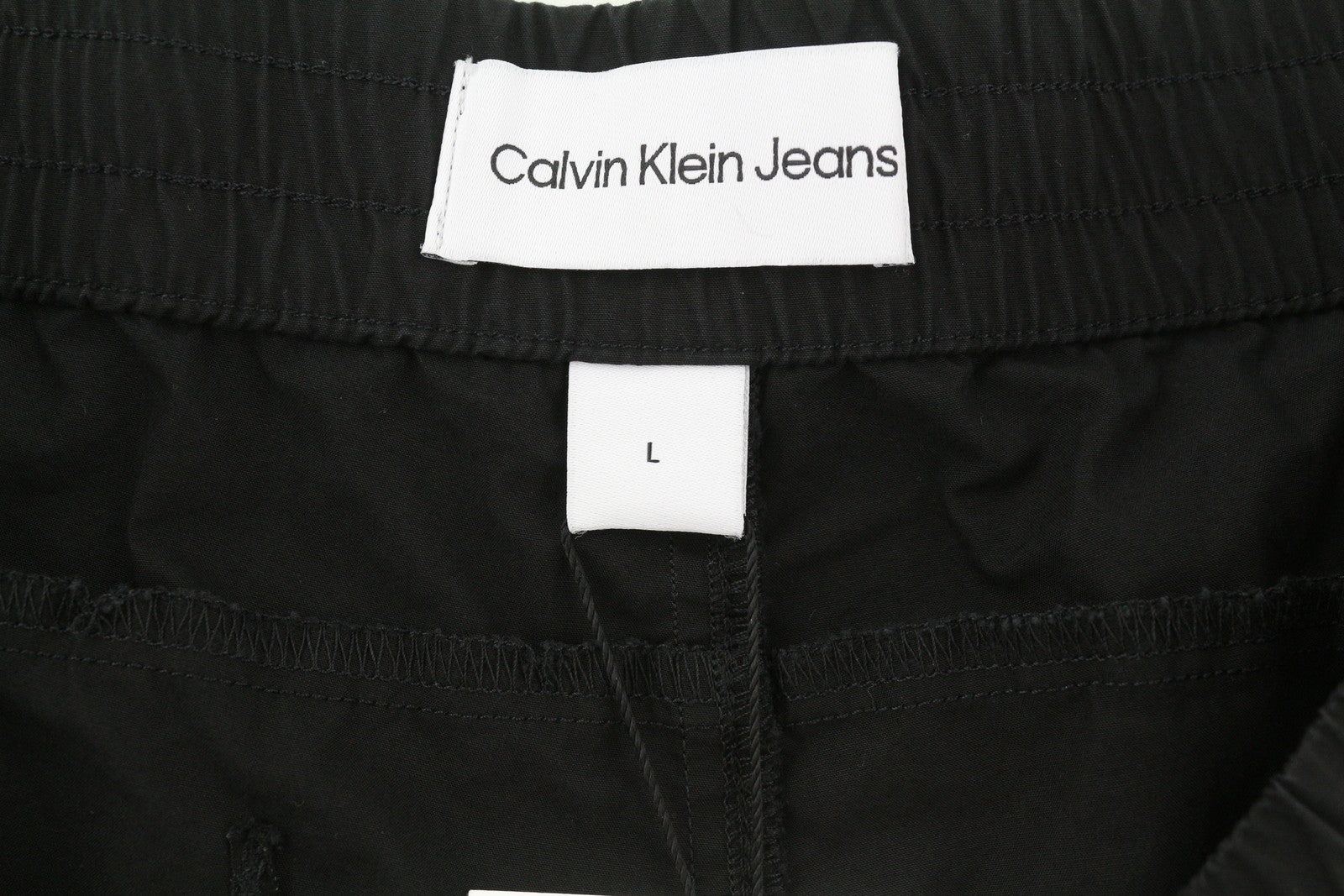 CALVIN KLEIN Utility Cotton Pop vyriškos kelnės L dydžio, juodos, su elastingu juosmeniu ir logotipu.